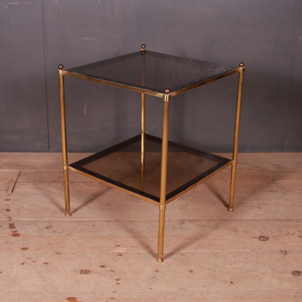 1950s French brass and glass side table with smoked glass, 1950.

Dimensions
19.5 inches (50 cms) wide
19.5 inches (50 cms) deep
24.5 inches (62 cms) high.