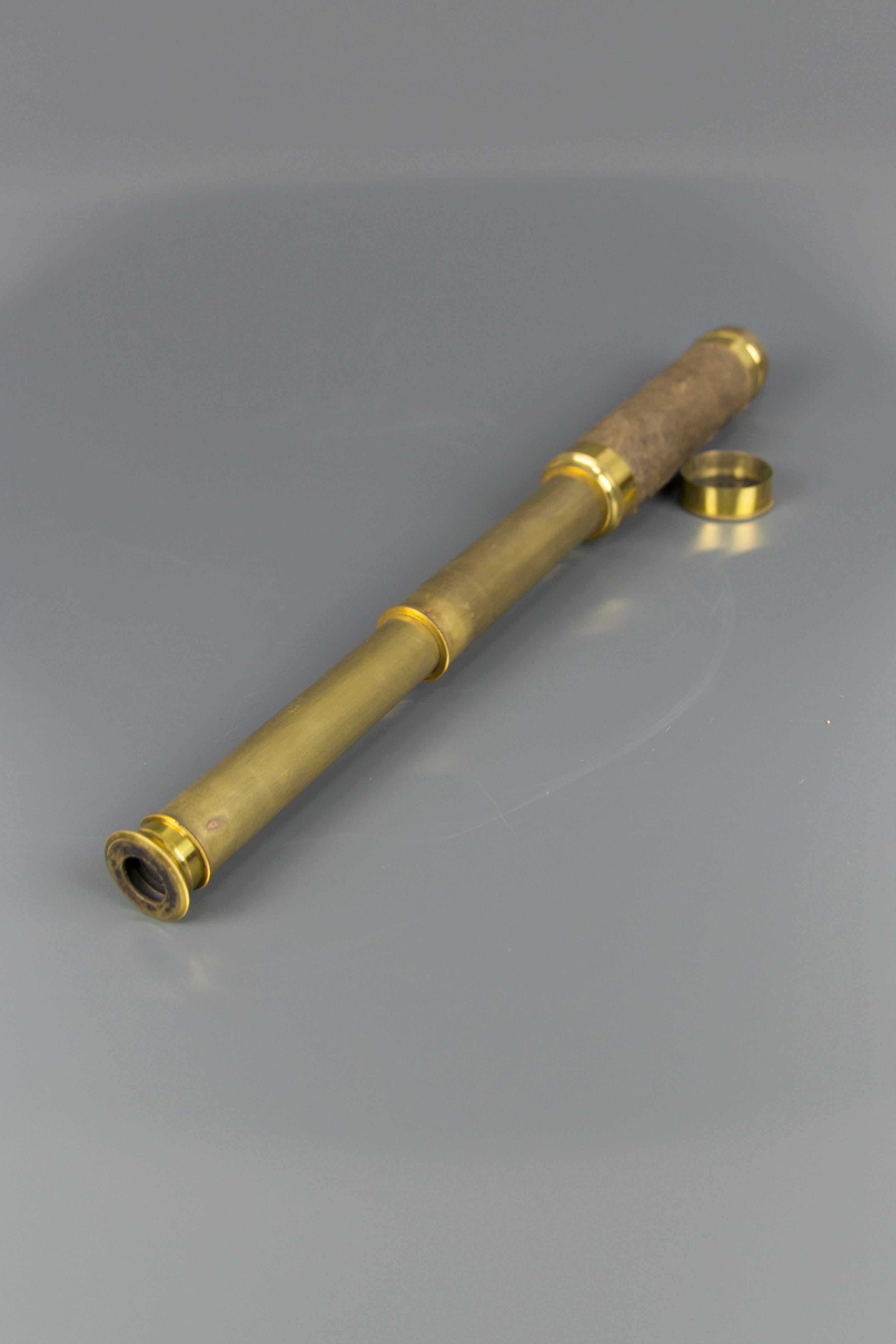Late 19th century French brass and leather 3 draw telescope spyglass.
The spyglass is made from brass. The base is wrapped with leather. Comes with the original case.
When extended, it measures 57 cm / 22.44 in long. When closed, the spyglass