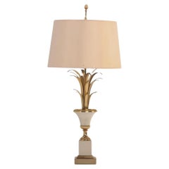 Französische Tischlampe aus Messing und poliertem Stahl, Maison Charles C. zugeschrieben 1950.