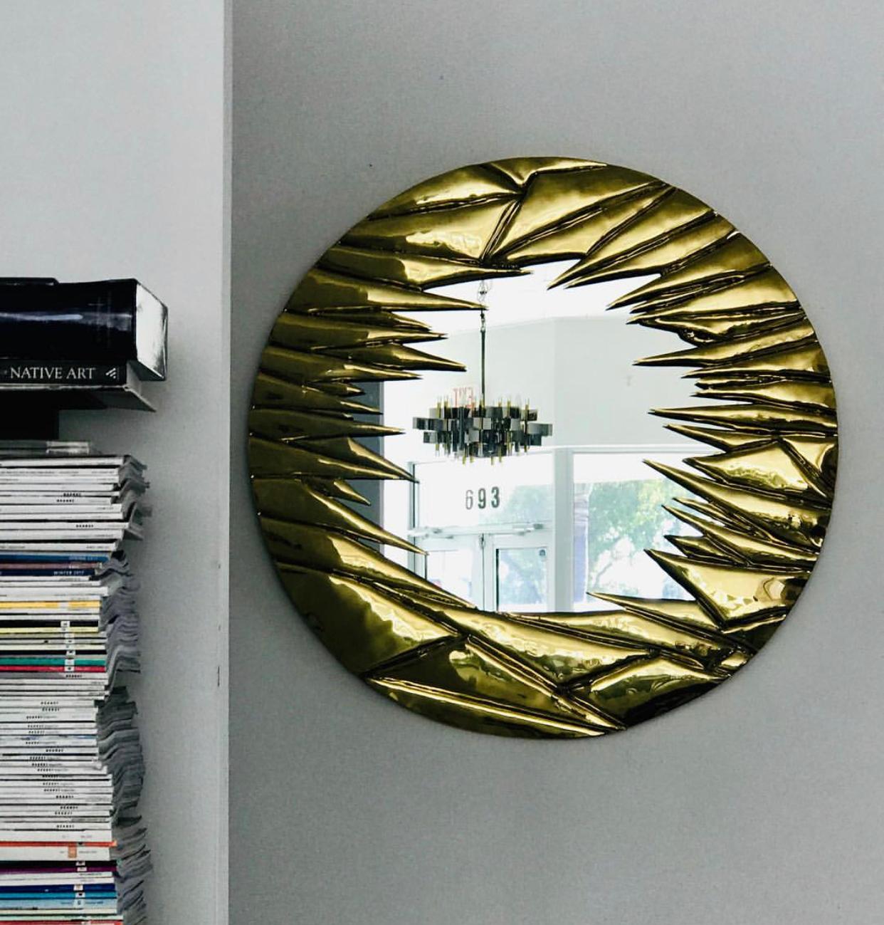 A custom studio made mirror by French designer and sculptor Alain Chervet, circa 1981. Unique piece in solid brass with sculptural corrugated folding form, partially Brutalist, partially Hollywood Regency, glamorous and bespoken. Signed and dated.
