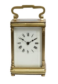 French Brass Cased Carriage Clock Standing on Bun Feet
