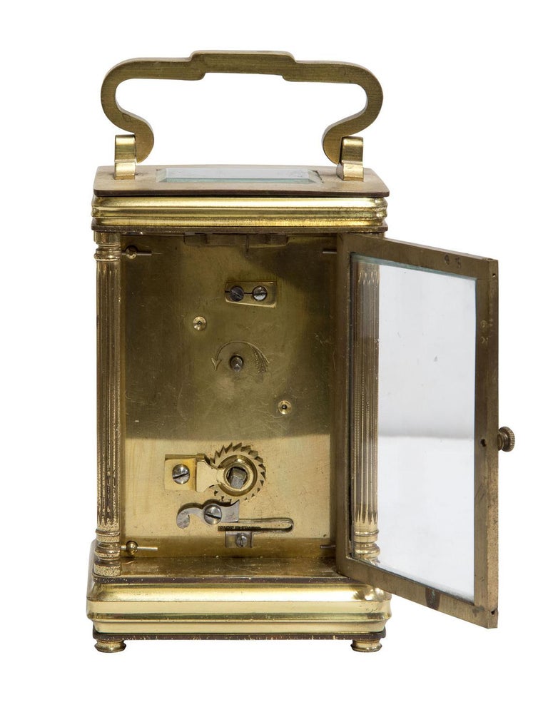 French Brass Cased Carriage Clock Standing on Bun Feet For Sale at
