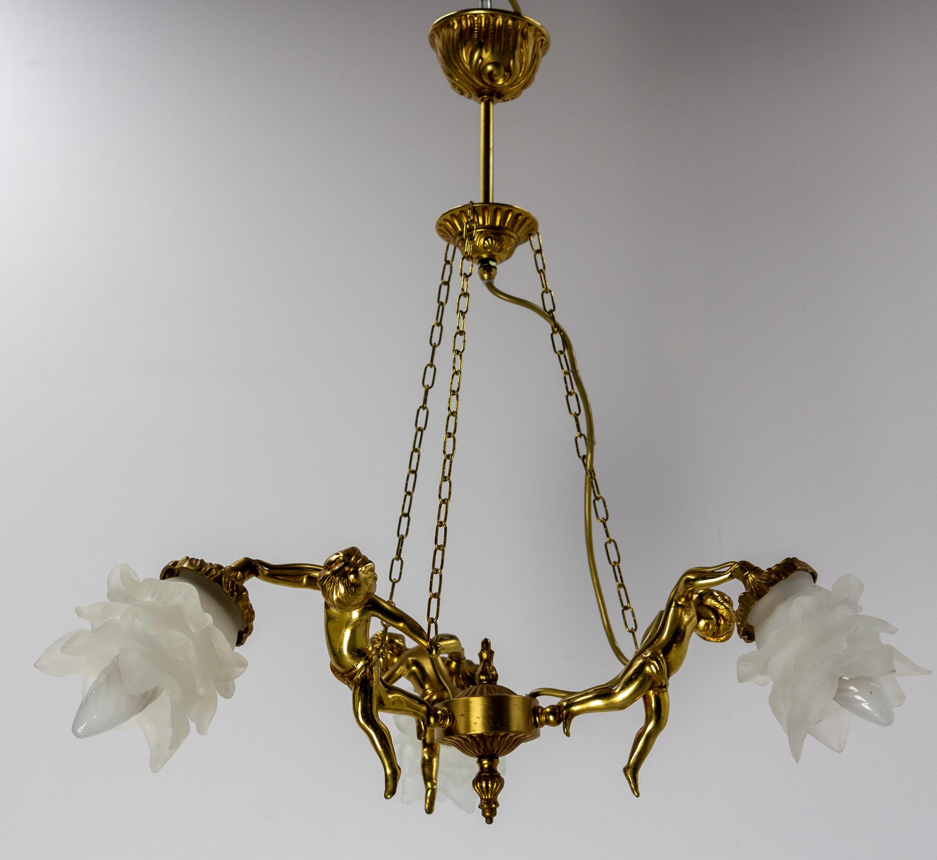 Ceiling pendant, France.
Lustre made in brass with frozen glass for the tulips. 
Soft and pleasant lighting.
This chandelier is conform to USA and EU or UK standards.
Good condition.

Shipping : 55 / 62 / 18 cm 4.6 kg.
 