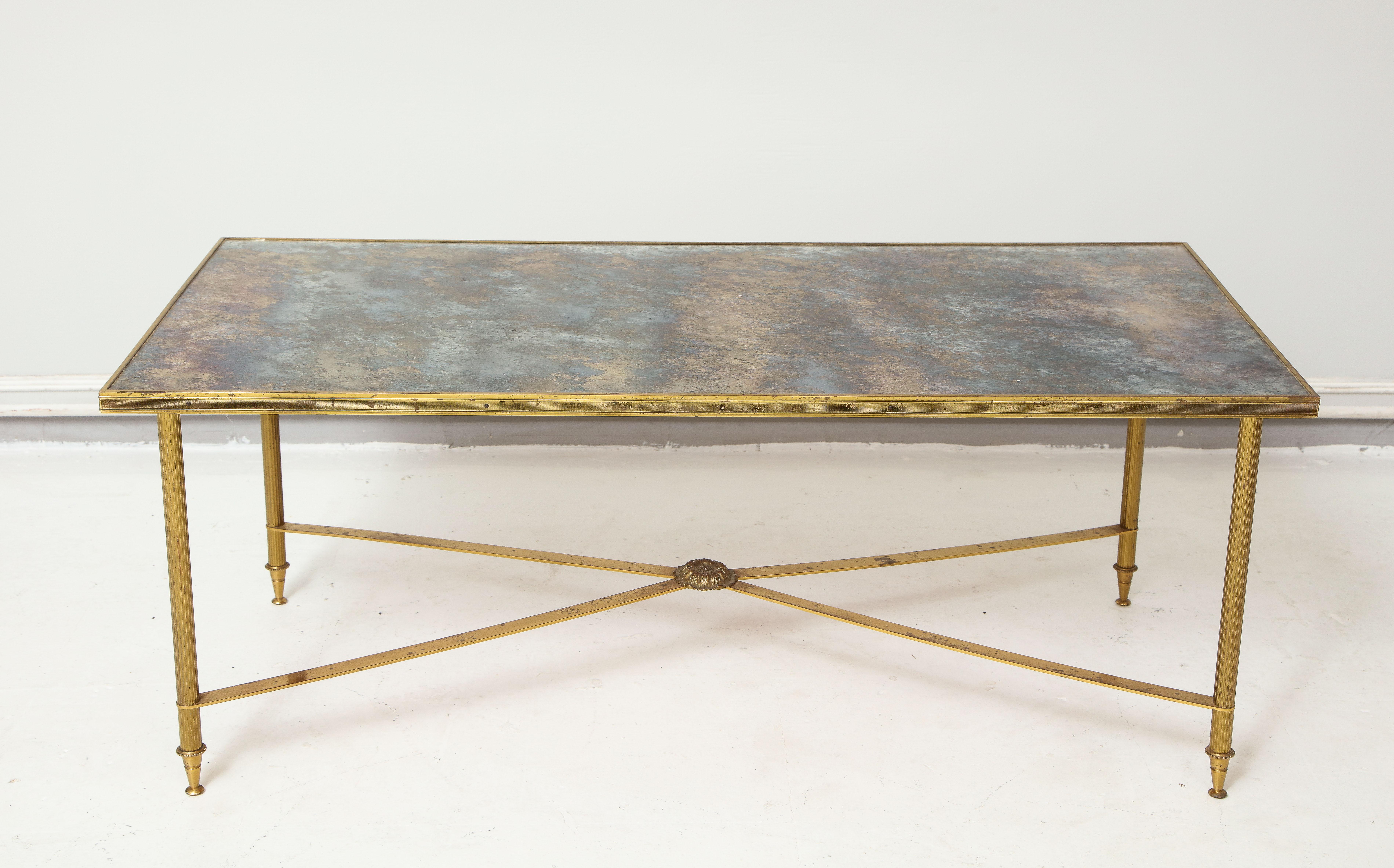 French brass Directoire style coffee table with mirrored top
Measures: Height 14.5