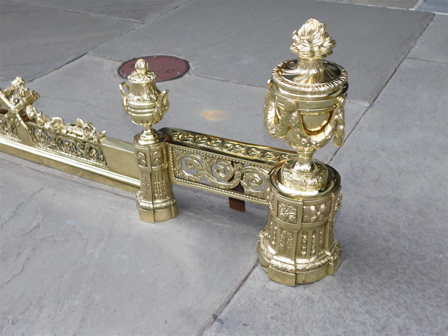Late 18th Century French Brass Flanking Flame Urn Finial Foliage & Swag Fireplace Chenet, C. 1790 For Sale