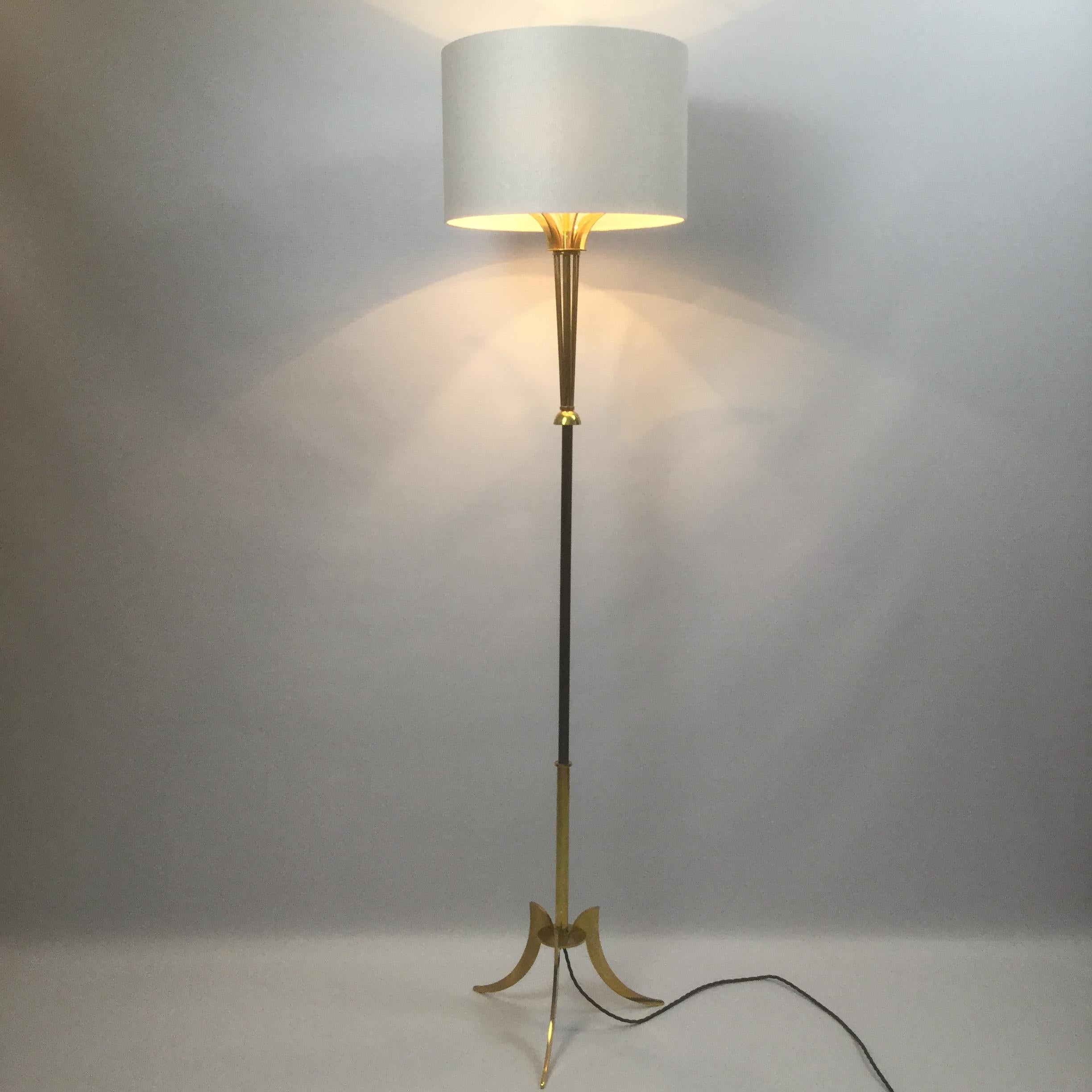 Brass lamp attributed to Maison Jansen
A pair is available
Rewired with black cotton-insulated cable.