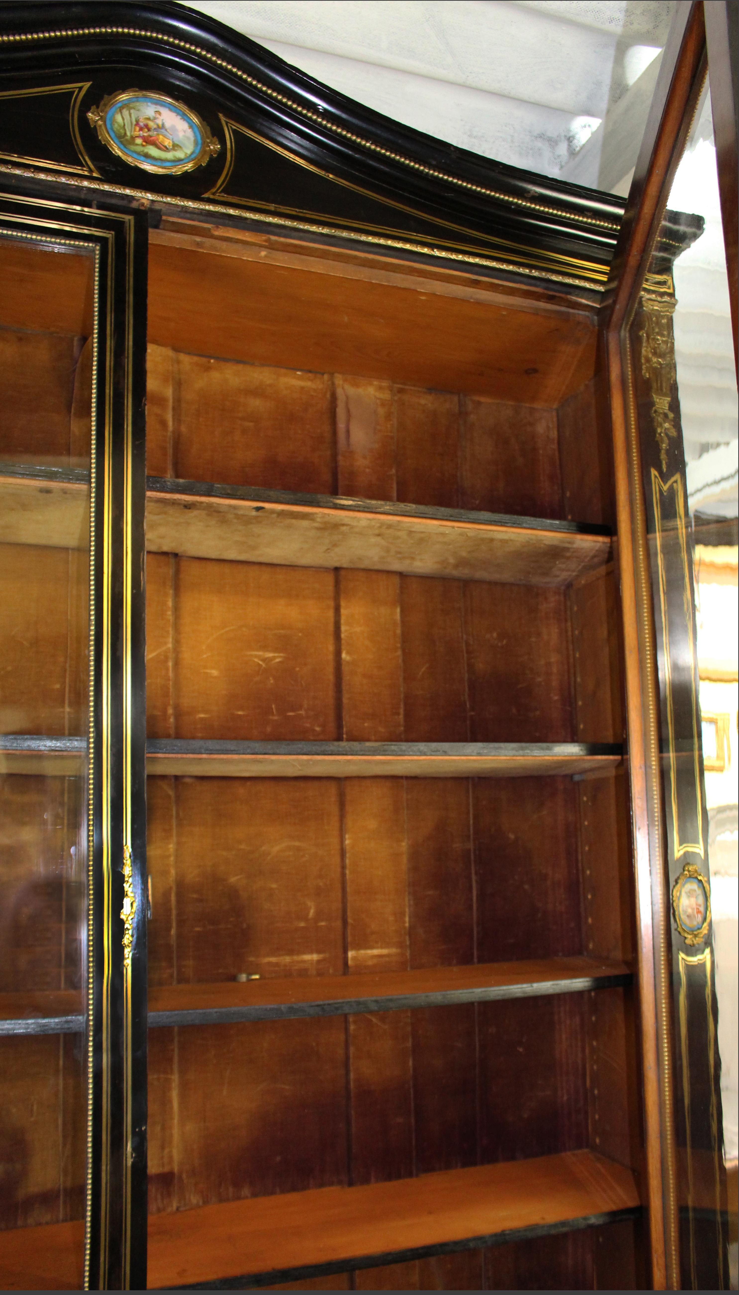 19th Century French Brass Inlaid Ebonized Bookcase with Sevres Plaques c.1820 For Sale