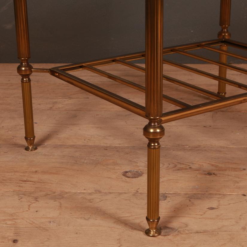 Single 20th century French brass and glass lamp table with a slatted under tier. 1950.


Dimensions:
22 inches (56 cms) wide
18 inches (46 cms) deep
16 inches (41 cms) high.
 