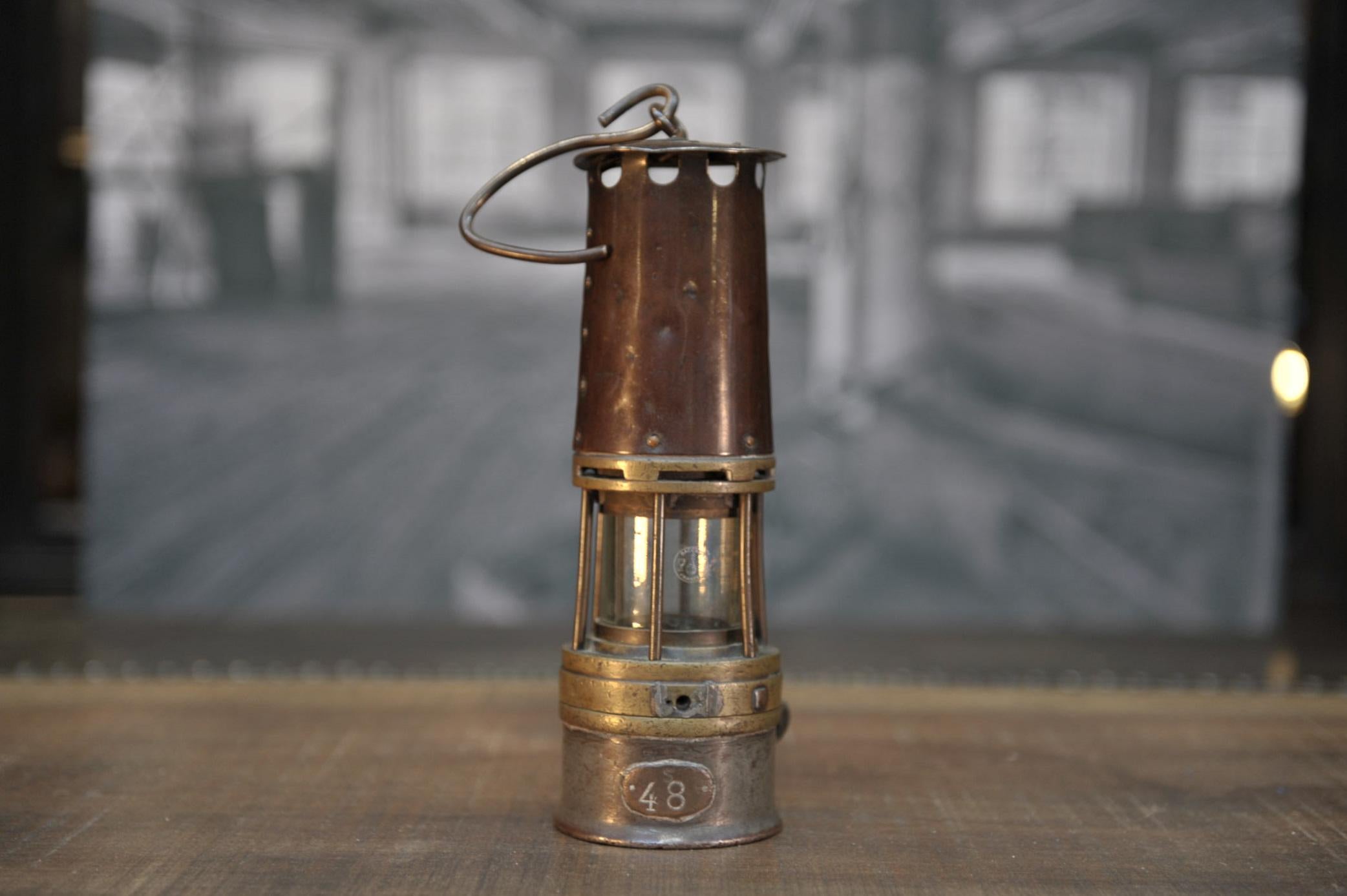 French brass mineur lampe or lanterne with baccarat glass from France, circa 1930.