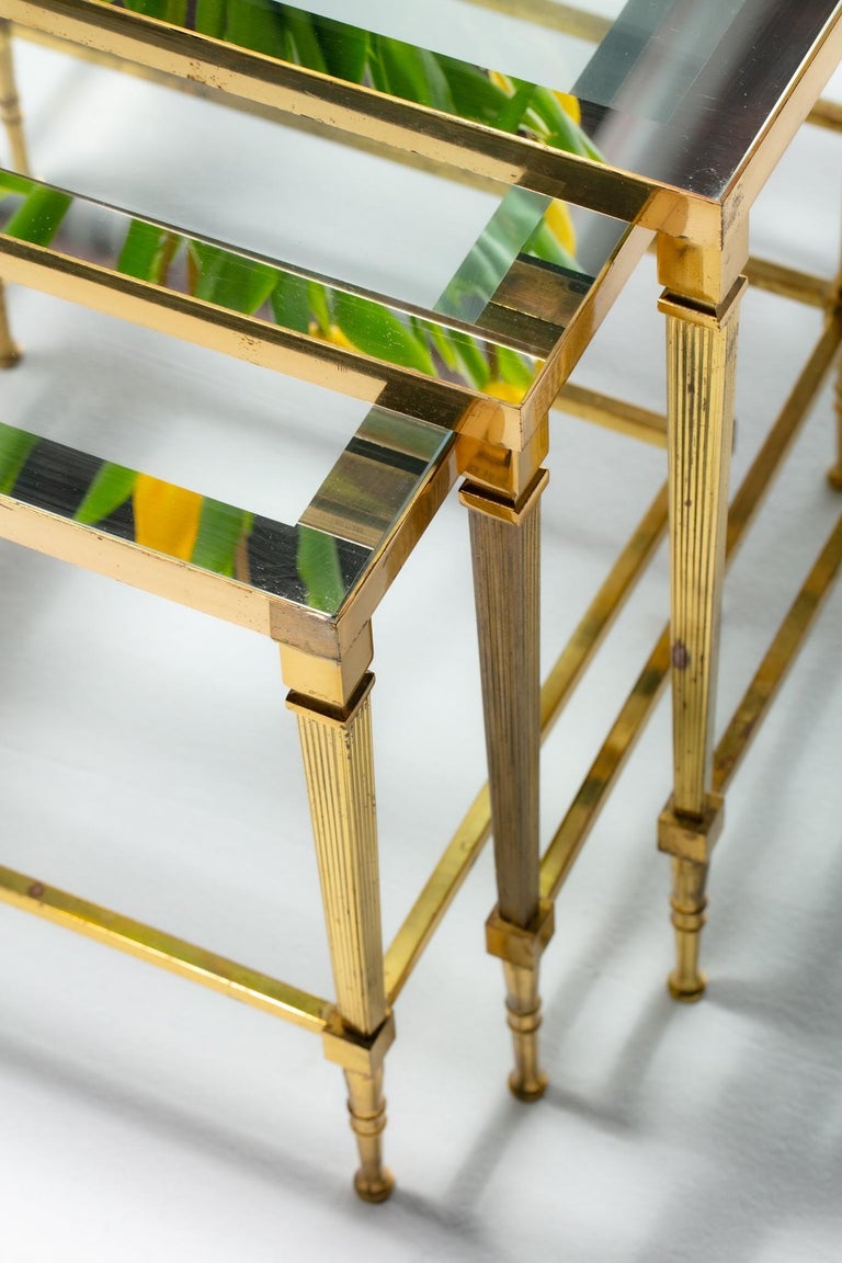 French Brass & Mirrored Glass Nesting Tables Attributed to Maison Baguès, c 1960 In Good Condition For Sale In Saint Louis, MO