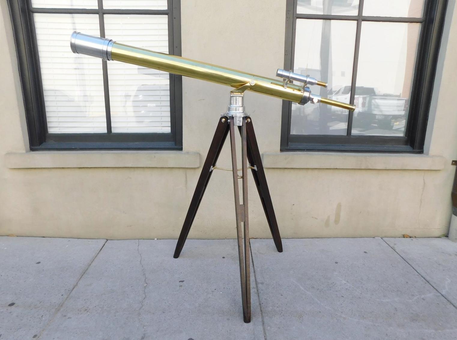 French brass and polished steel telescope with removable lens cap, spotting scope, and mounted on folding tripod stand, 19th Century. 
Signed on focal tube by prolific telescope makers Bardou & Son, Paris, France. Telescope is in working condition