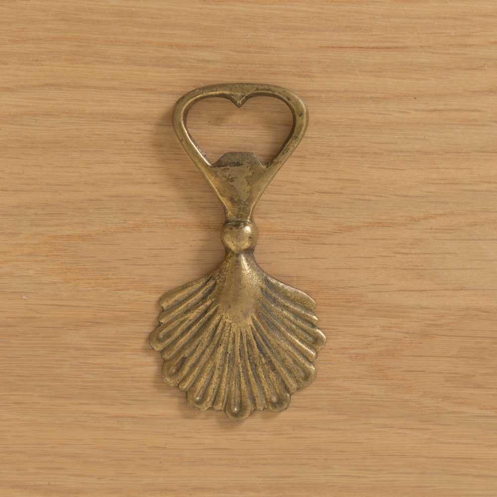 Unique vintage solid brass shell bottle opener from France, 1950s. Beautiful etched brass with intricate details and curved handle. Heavy and solid. Perfect gift. 