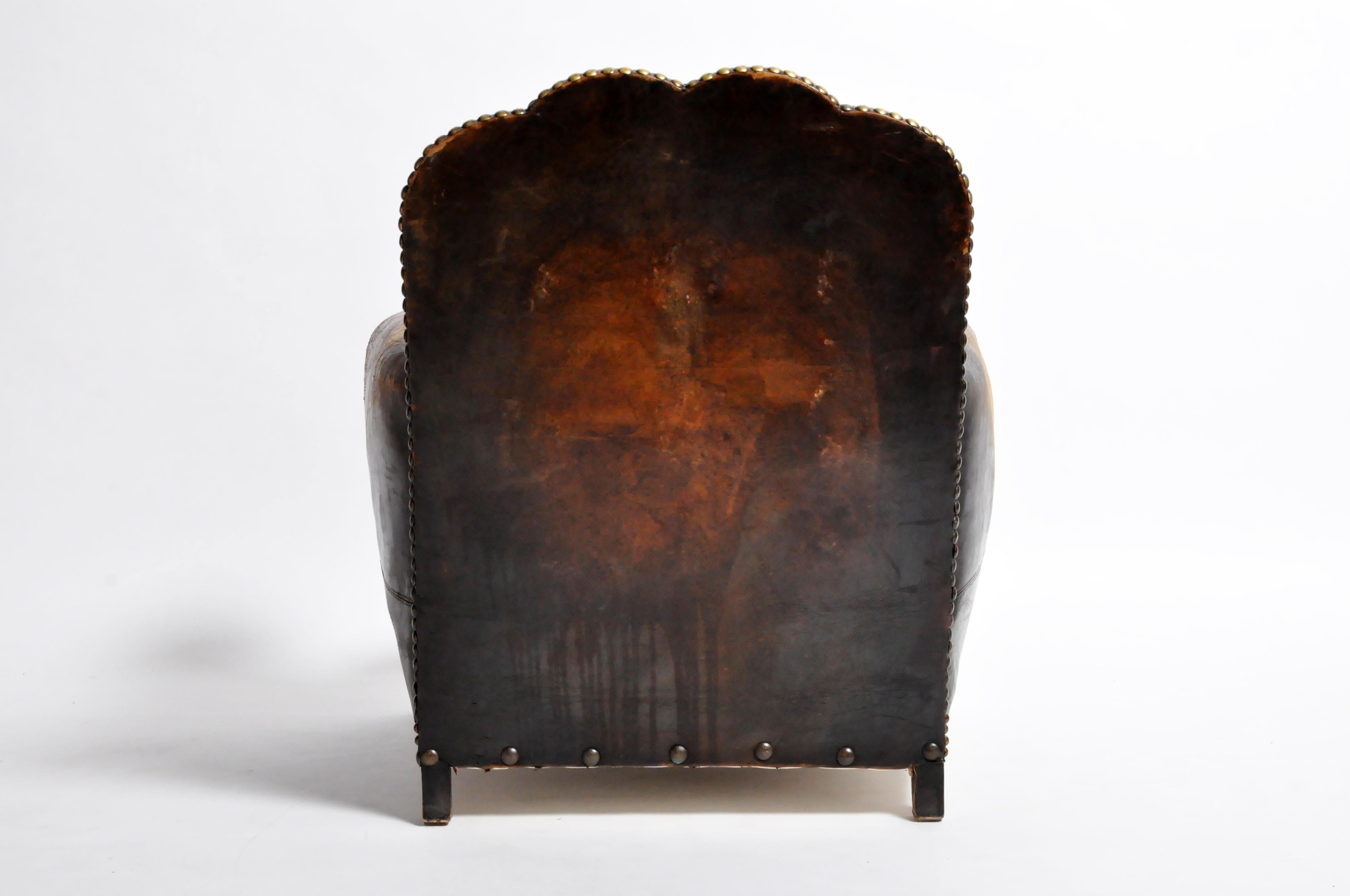 studded leather armchair