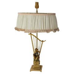 Vintage French Brass Table Lamp with Putti Reading in front of a Harp, Mid-Century