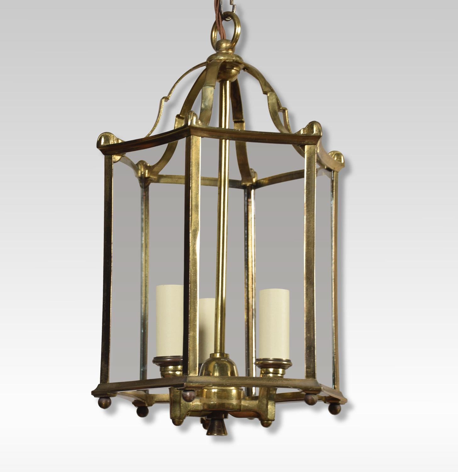 French brass and glass hexagonal paneled triple light hall lantern. The lantern has been re-wired.
Dimensions:
Height 15.5 Inches
Width 9.5 Inches
Depth 9.5 Inches.
