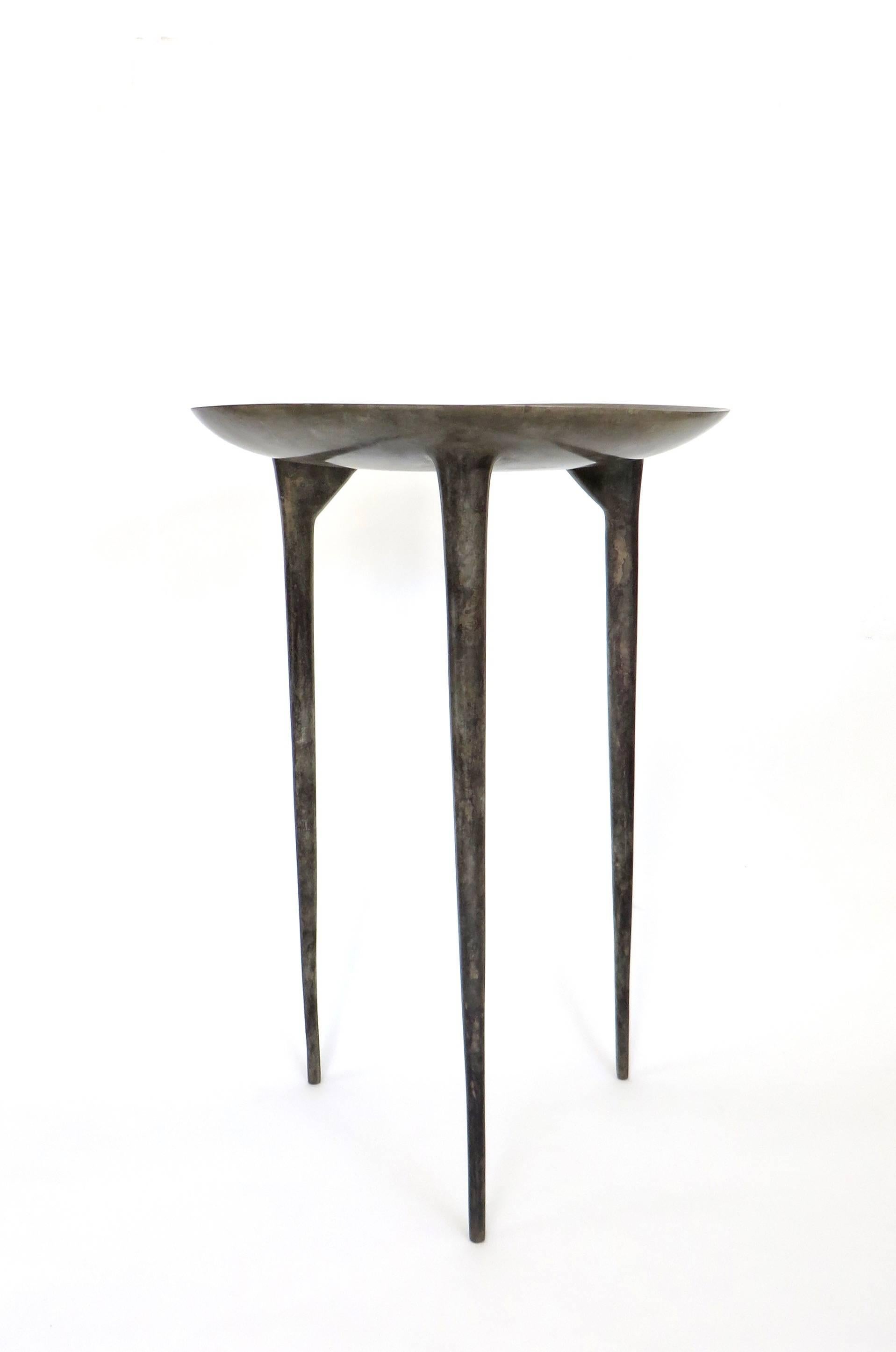 Handmade tall three-legged bronze brazier from the Rick Owens home collection. 'Tall Brazier' three-legged table in solid bronze with nitrate finish. Shown is the nitrate finish. 
Please note the lead time is 8 weeks after payment. 
The tall brazier