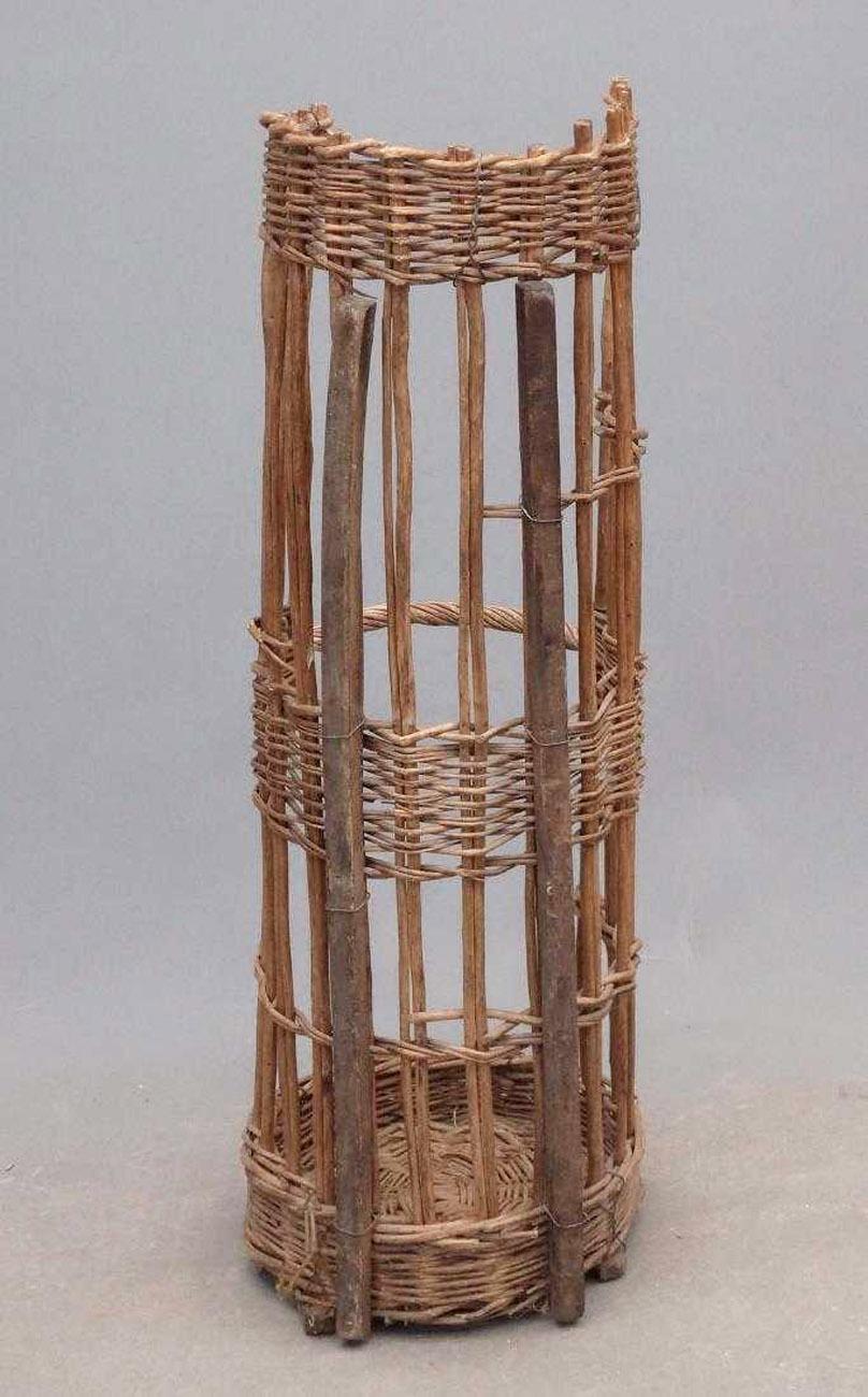 Vintage French bakery standing baguette bread basket with deepened color and patina as well as normal signs of wear from daily use. Consider using this for an umbrella stand or dried flower planter or decorative basket in that country kitchen.