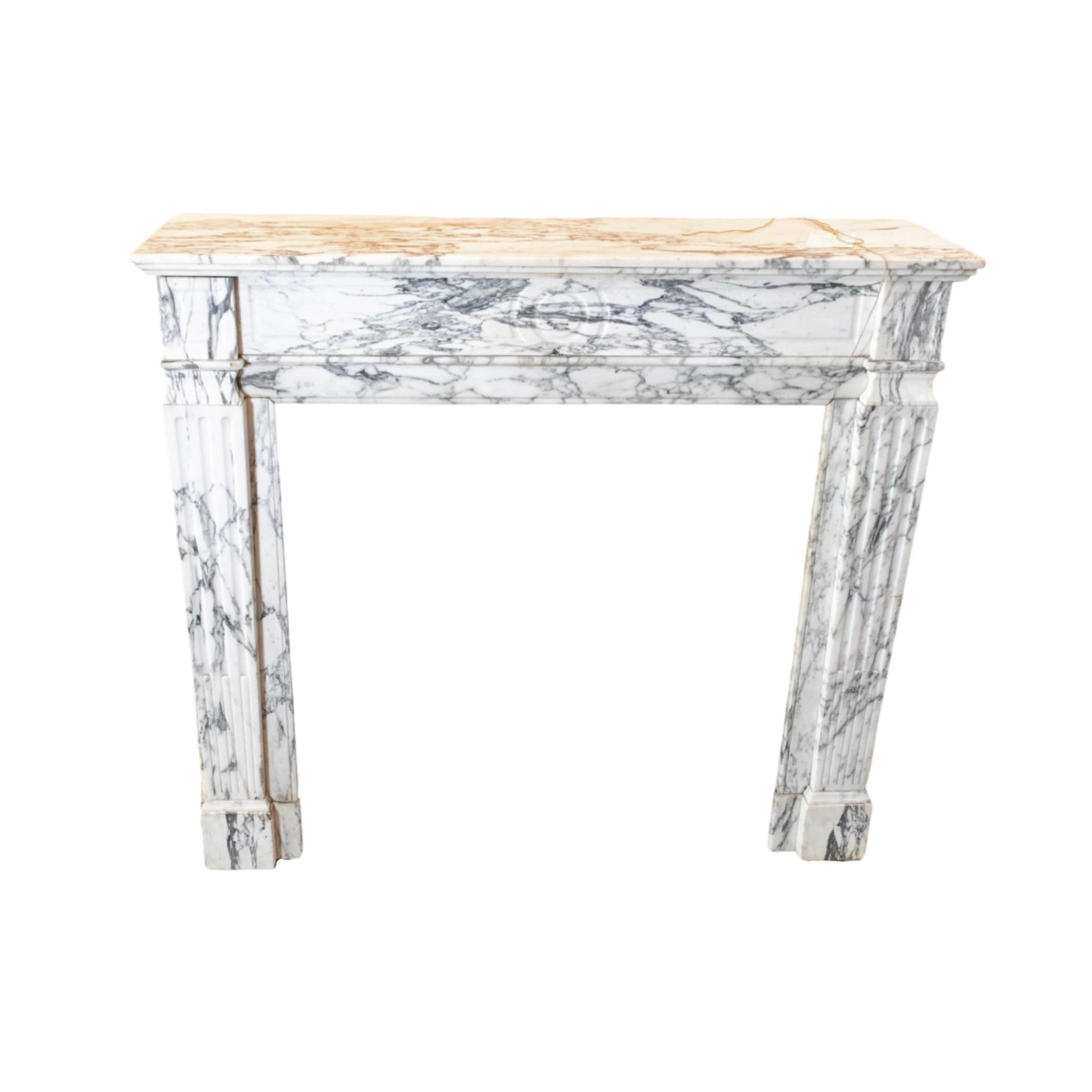 Louis XVI-style mantel. Made out of Breccia white marble. Originates from France. Circa, 1880. 

 

Measurements: 

W: 49.25