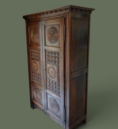 French Breton Two-Door Oak Armoire, Carved Geometric Panels, 1940s