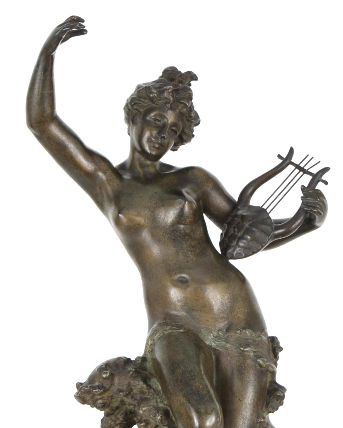 French patinated Bronze figure of a sea nymph after the original by Gustavo Obiols (1858-1910) exhibited at the Paris Salon of 1896.