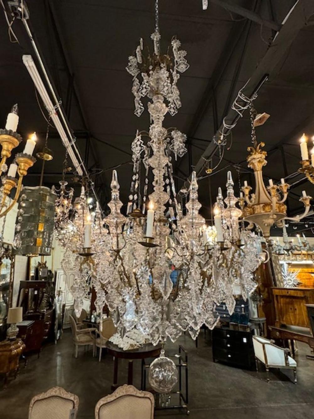 Magnificent 18th century French bronze and crystal cathedral chandelier. Circa 1800. The chandelier has been professionally rewired, comes with matching chain and canopy. It is ready to hang!