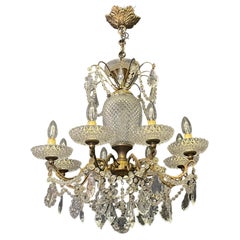 French Bronze and Crystal Eight -Light Chandelier, circa 1940s