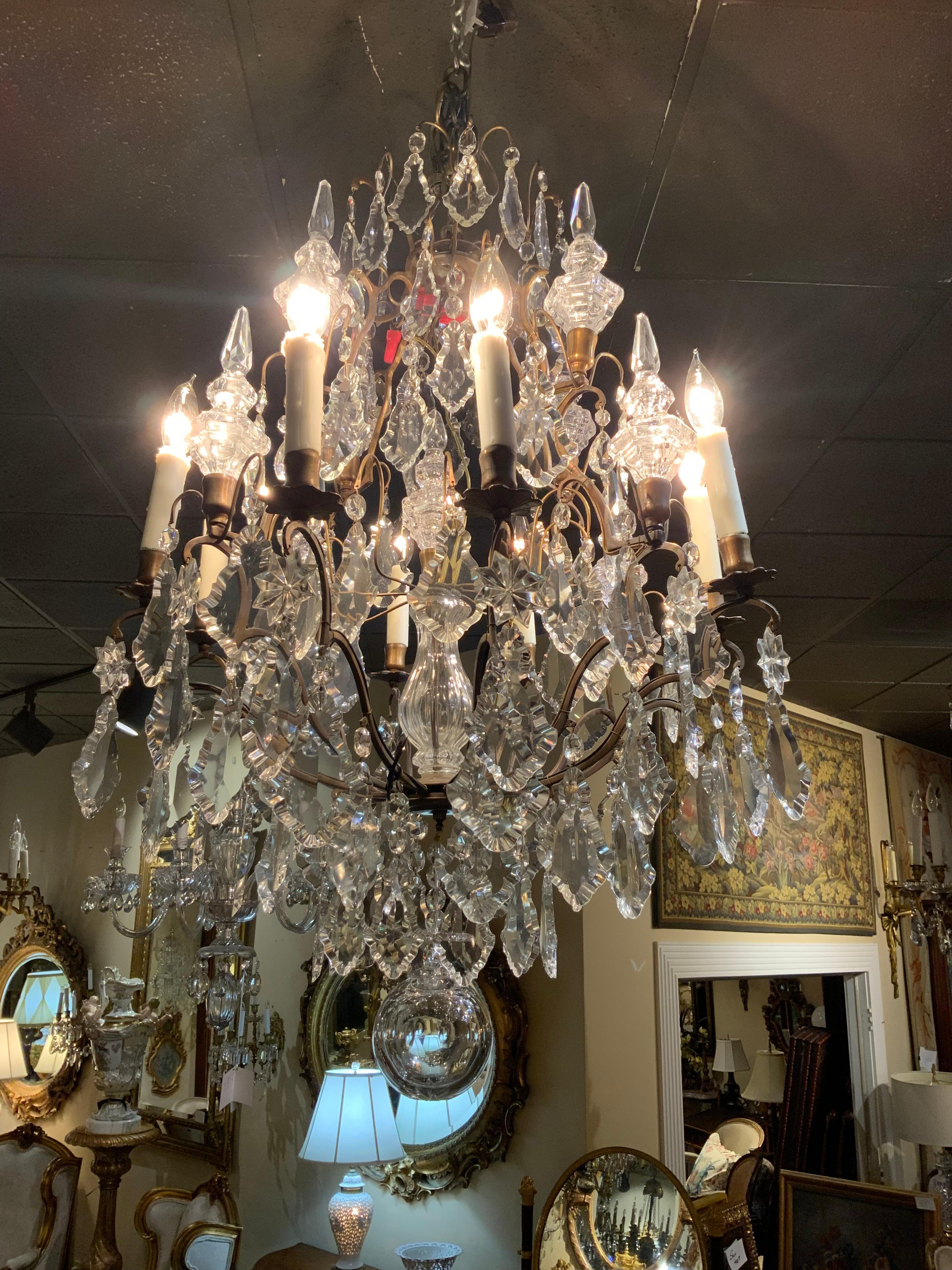 French bronze and crystal eight light chandelier  In Excellent Condition For Sale In Houston, TX