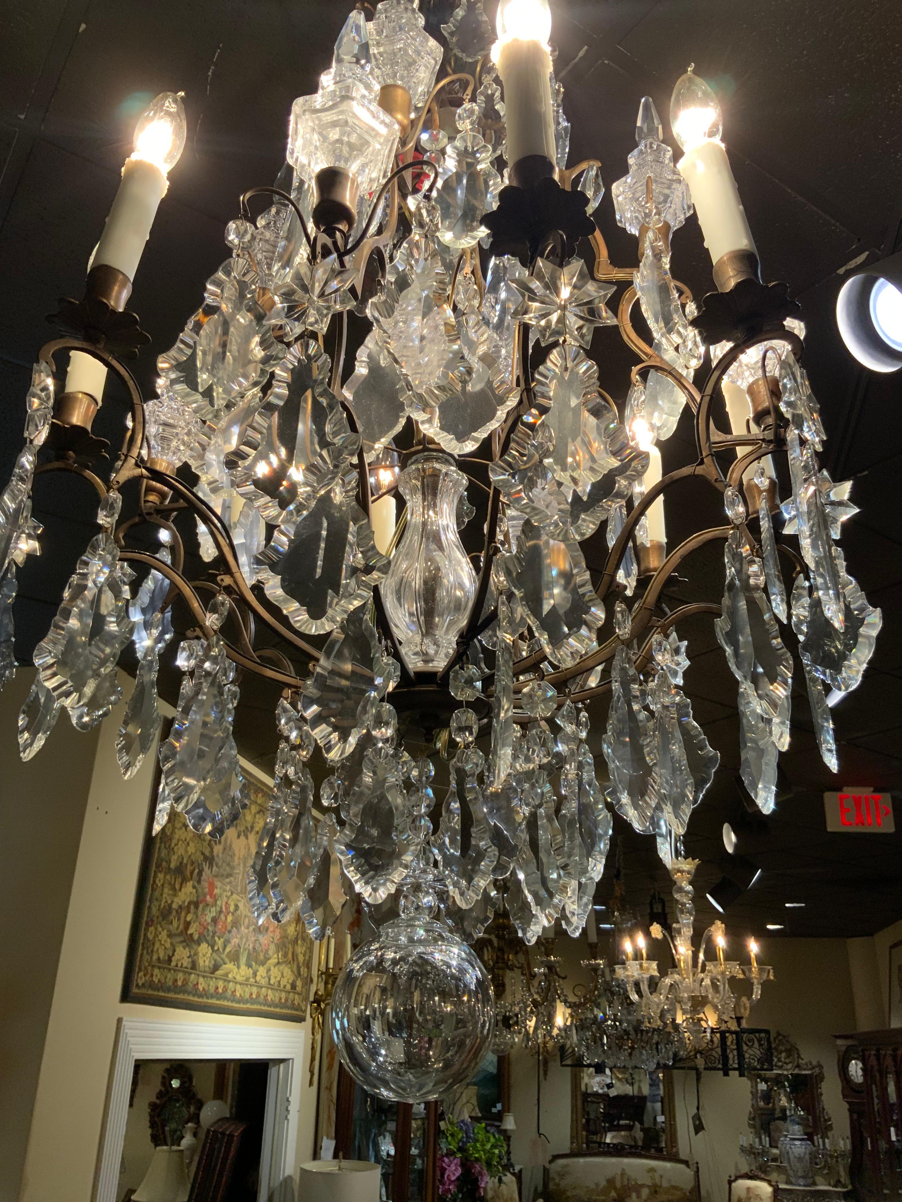 Bronze French bronze and crystal eight light chandelier  For Sale