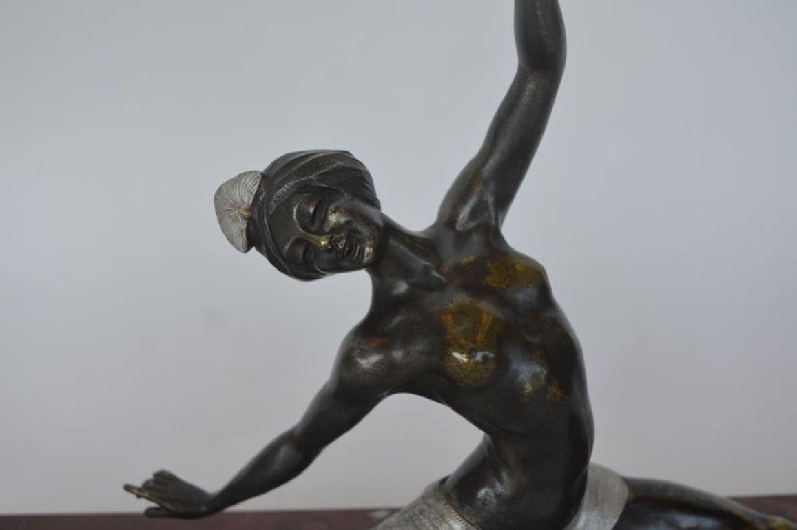 French bronze Art Deco ballerina sculpture by Marcel Guillemard that is posing gracefully on a marble base. Signed 