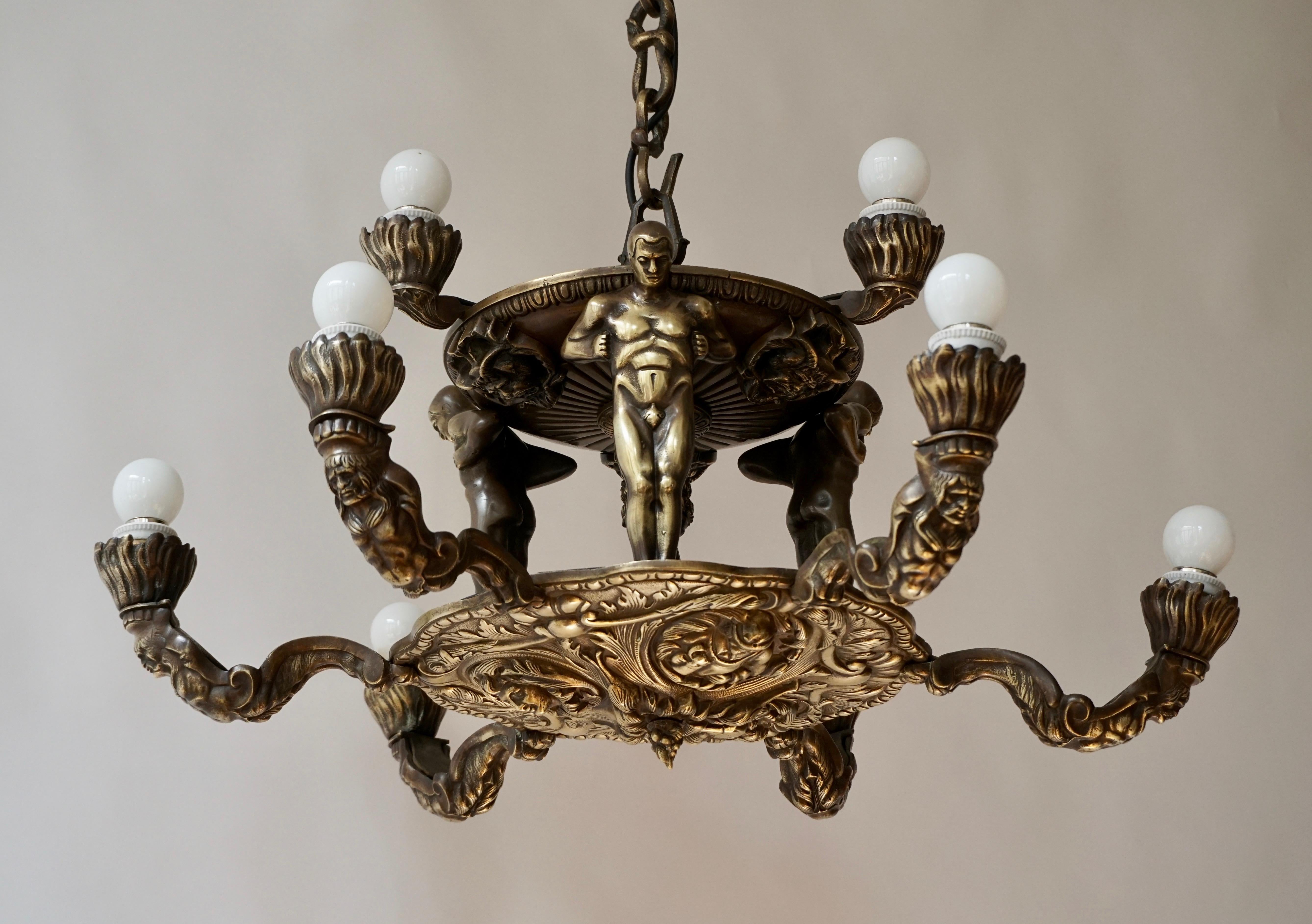 French Bronze Art Deco Hollywood Regency Chandelier Showing Male Nude Figures For Sale 2