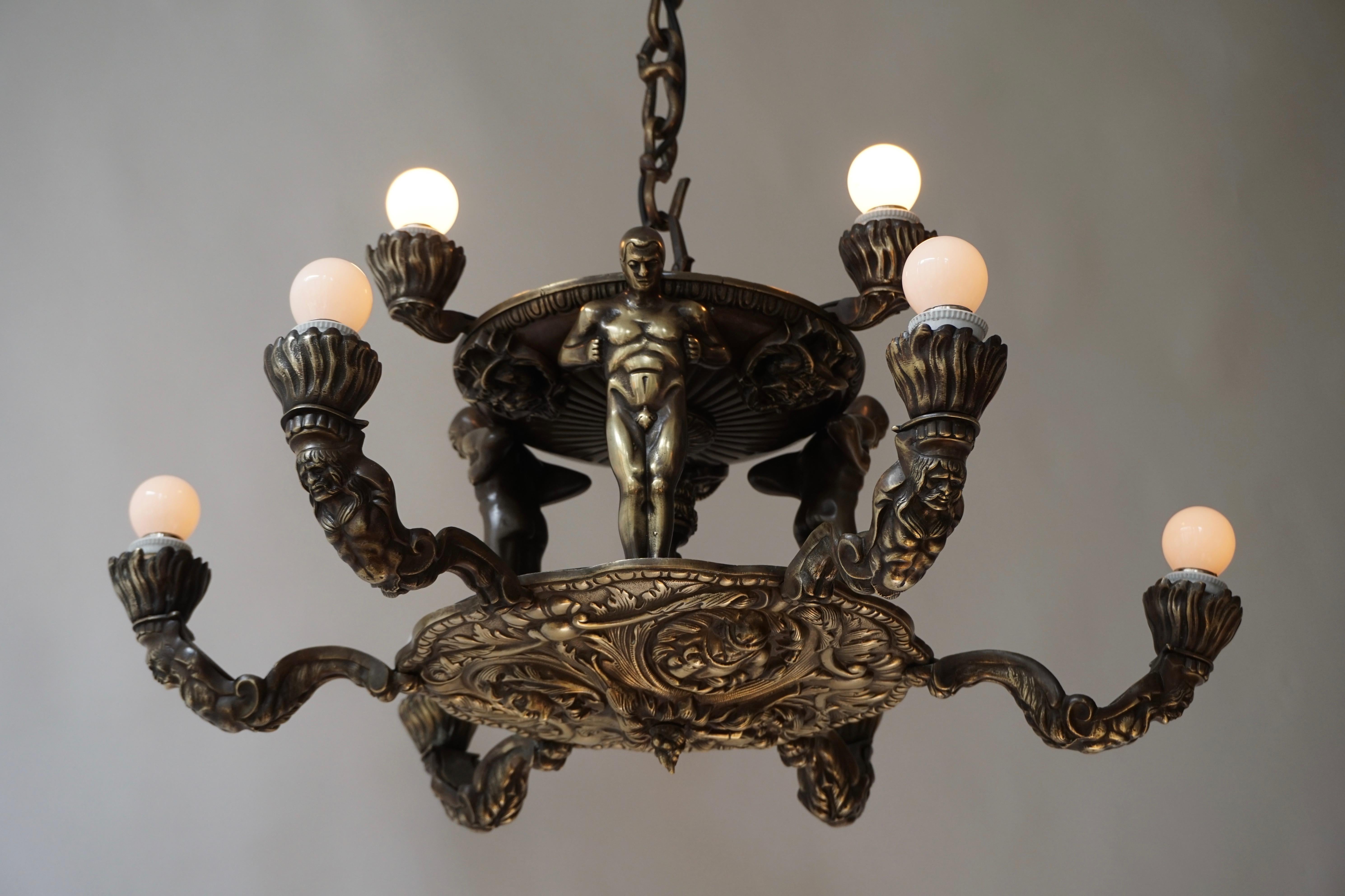 20th Century French Bronze Art Deco Hollywood Regency Chandelier Showing Male Nude Figures For Sale