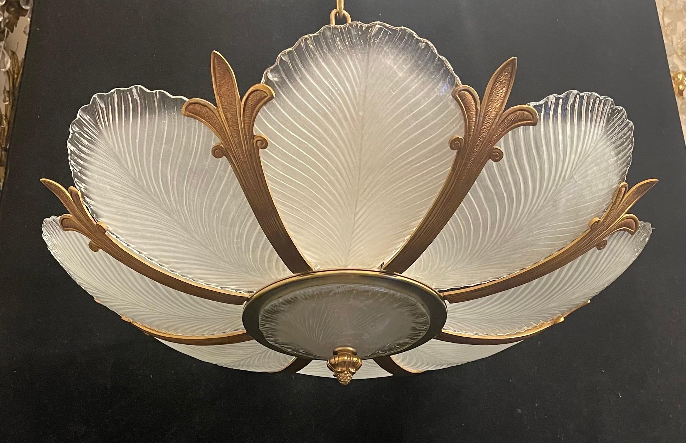 A wonderful French style bronze and art glass leaf form semi-flush mount large ceiling fixture with 8 UL candelabra sockets, this chandelier comes ready to install with all mounting hardware.