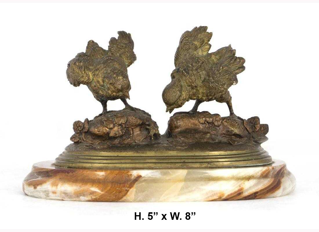 French bronze bird group sculpture, signed F. Pautrot.
Lovely French bronze bird group depicting two feeding birds on stepped bronze base, raised on a circular marble plinth, late 19th century.
The quality of the bronze work is top tier. 
Signed