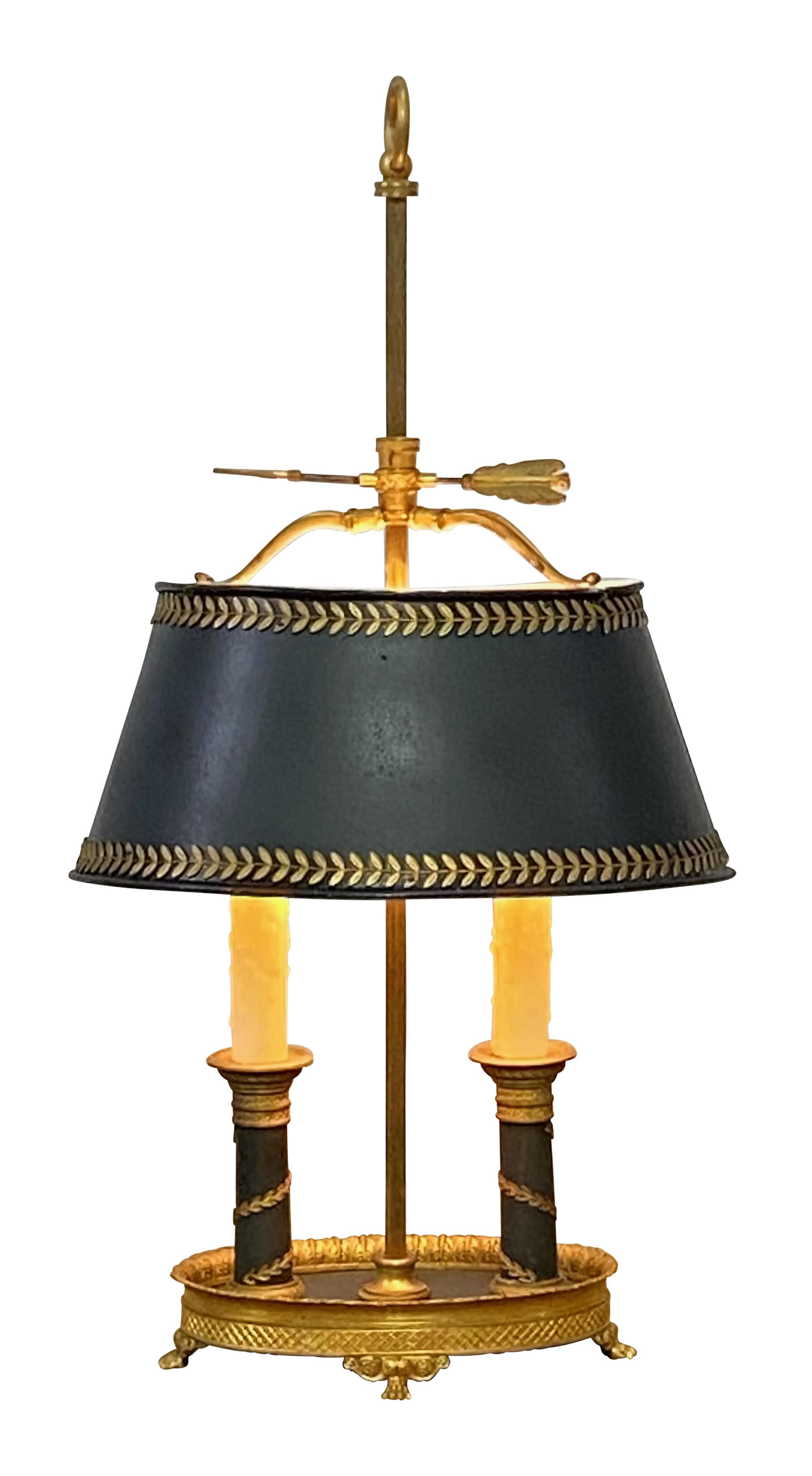 An exceptional quality bronze bouillotte lamp with tole painted tin shade.
Recently restored and rewired and in excellent condition.
France, early 20th century.



