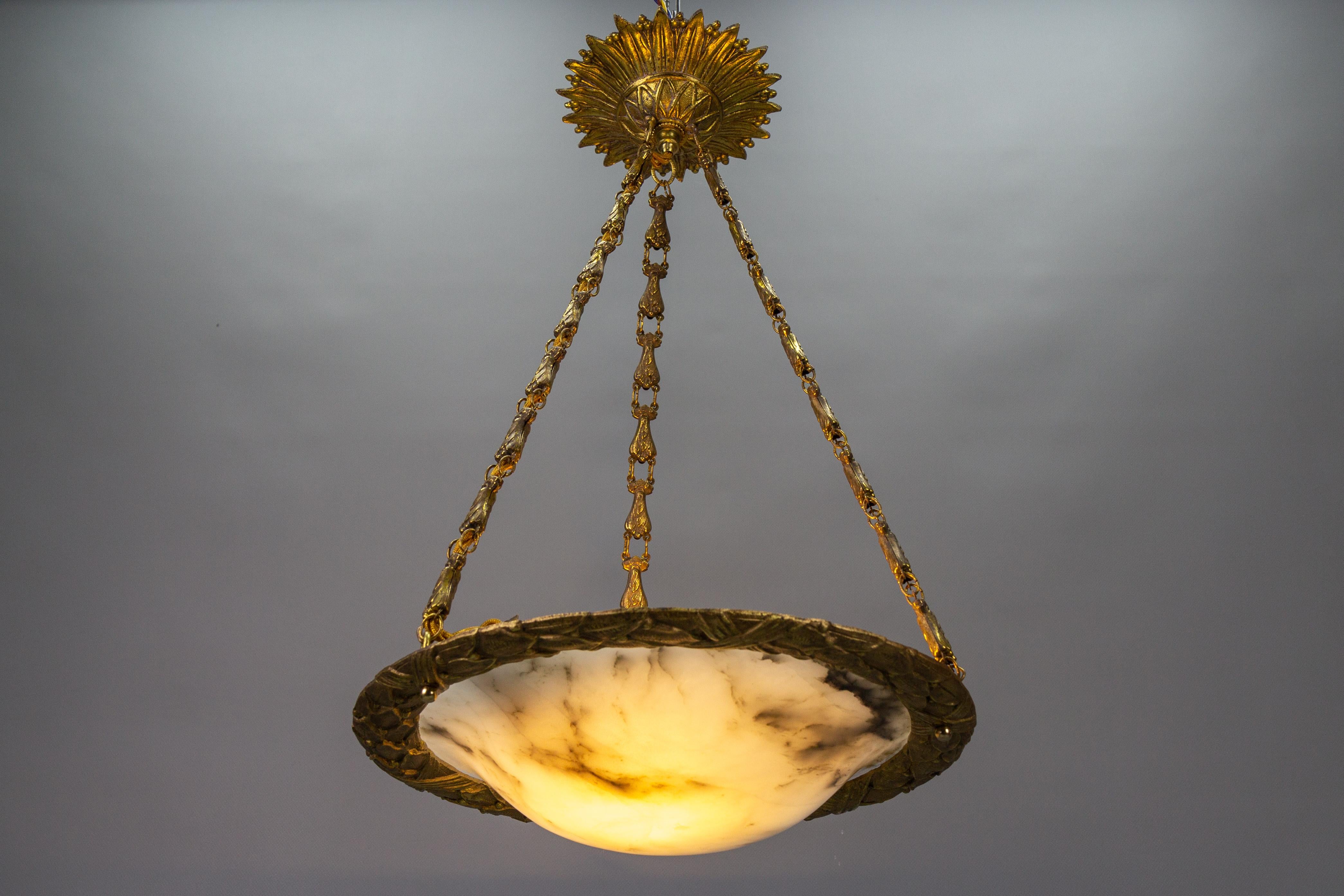 Brass French Art Deco Bronze and White Alabaster Pendant Light, ca. 1920