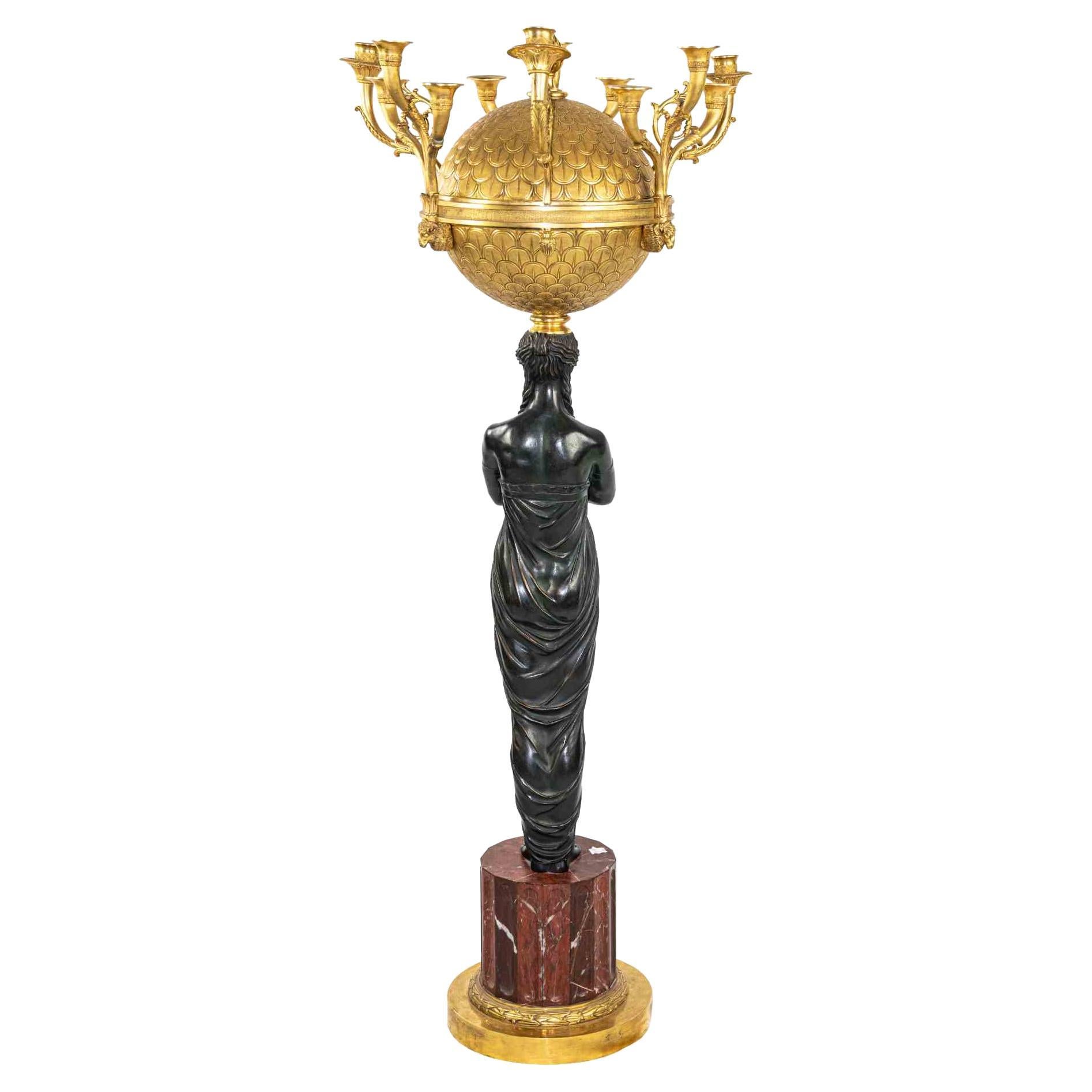 Candelabra is a decorative item realized of 19th Century.

Base in red French marble: 24 x 24 cm

The sculpture is a Core model by Pierre-Philippe Thomire.

The candelabrum is made in the early 19th Century in the Charles X era.

An example