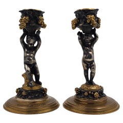 French bronze candlesticks by Ferdinand Barbedienne