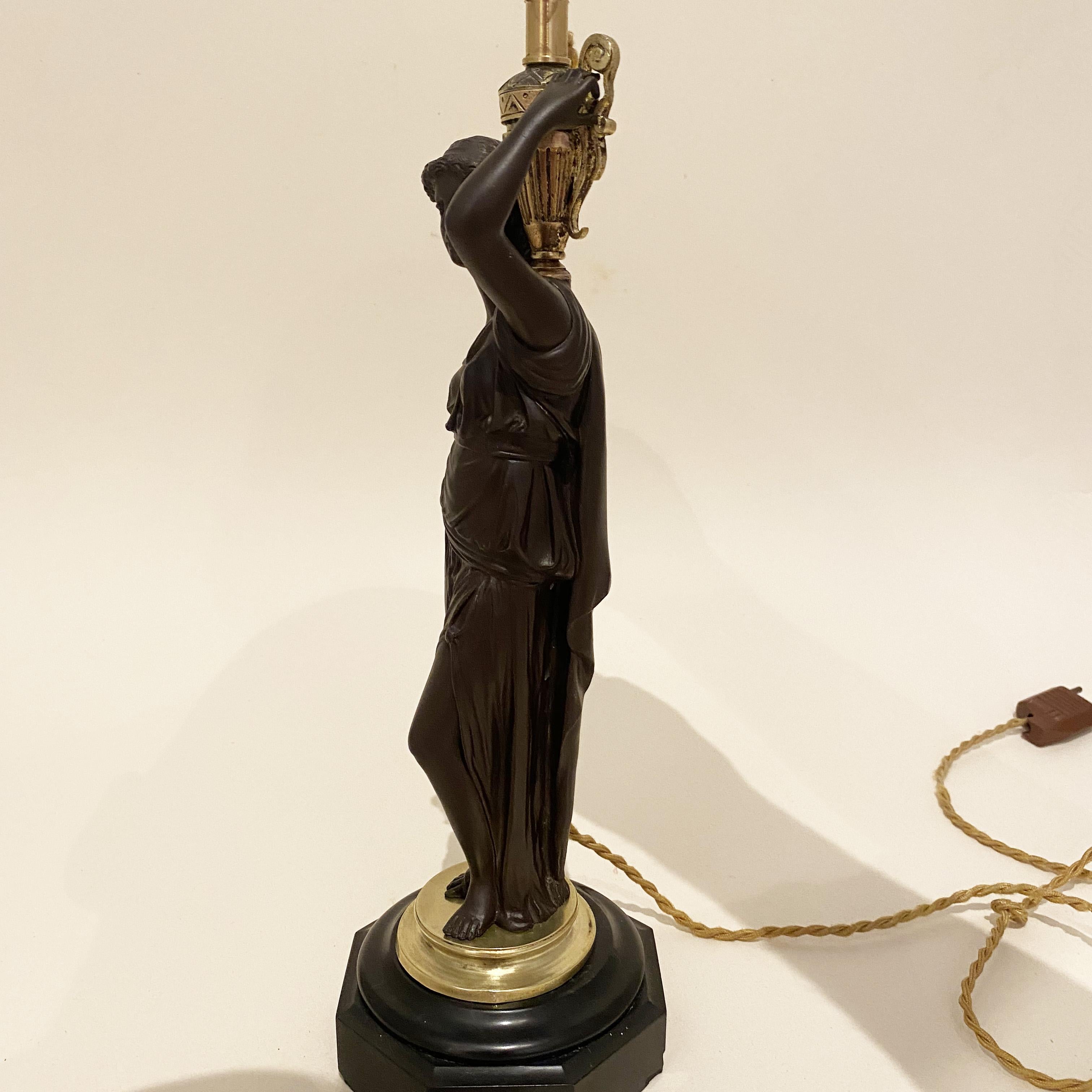 French Bronze Caryatid Candelabra Lamp, 
Water carrier woman (probably Sephora)
Some chips on the marble base.
XIX century.