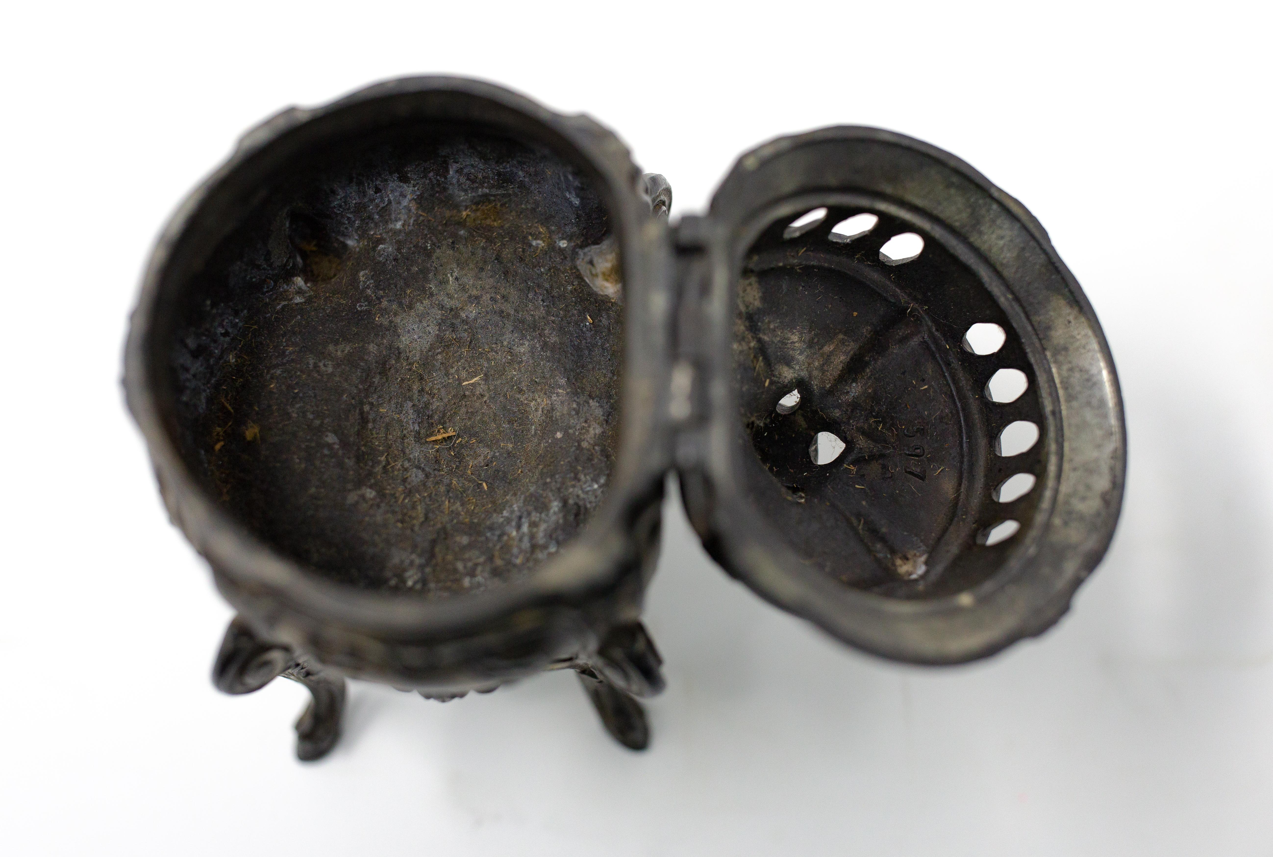 Offering this beautiful bronze censer that is French made. It starts on the bottom on four legs that are cabriole legs and works up to the body of the censer. The underside has a lotus flower and Marked, Made in France. There is a hinged lid that