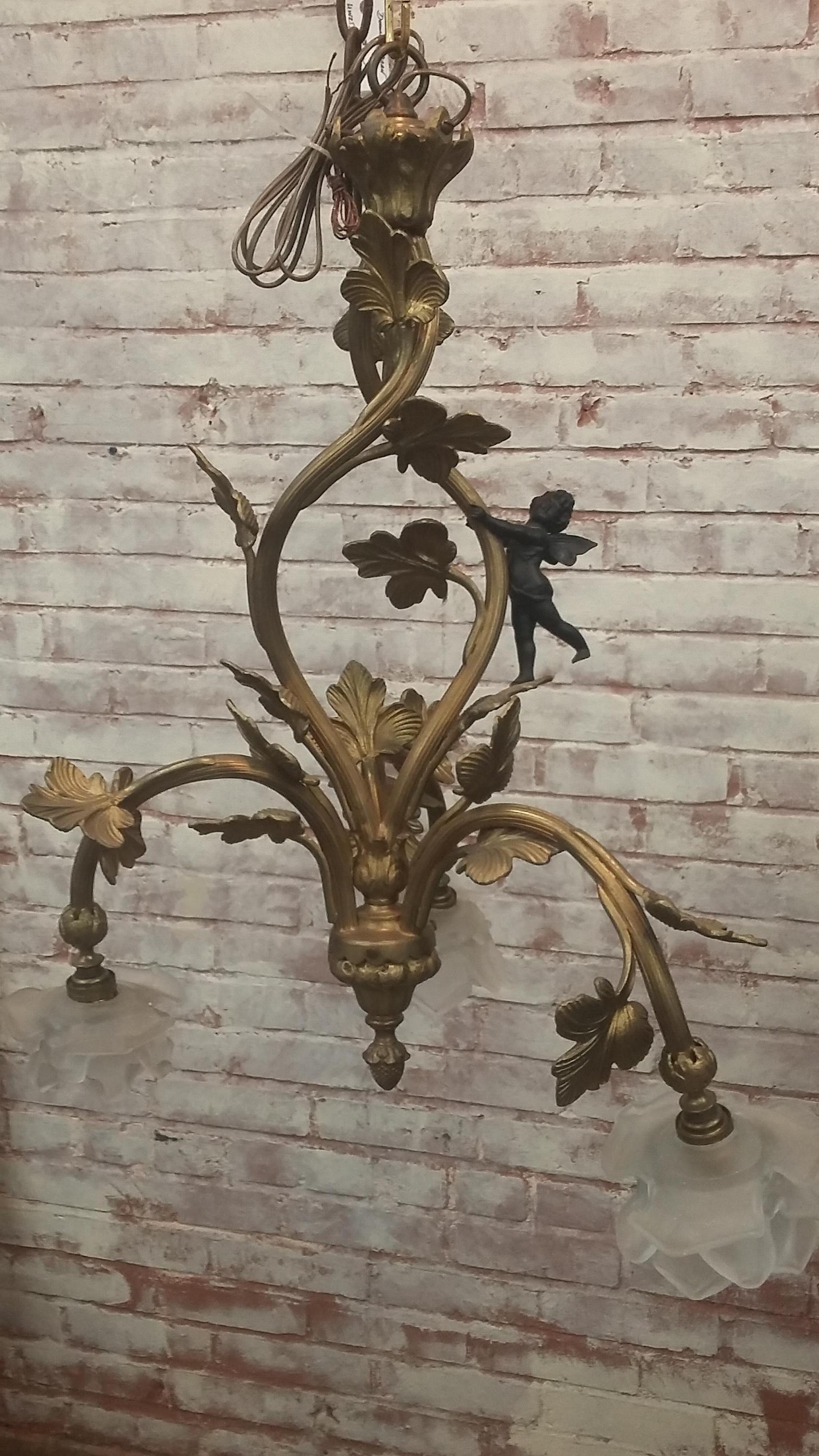 Beautiful vintage 19th century bronze cherub chandelier from France. All repolished and rewired for installation.
Terrific style 3 lights with cherub at the top. Nice one for the bedroom or foyer.
