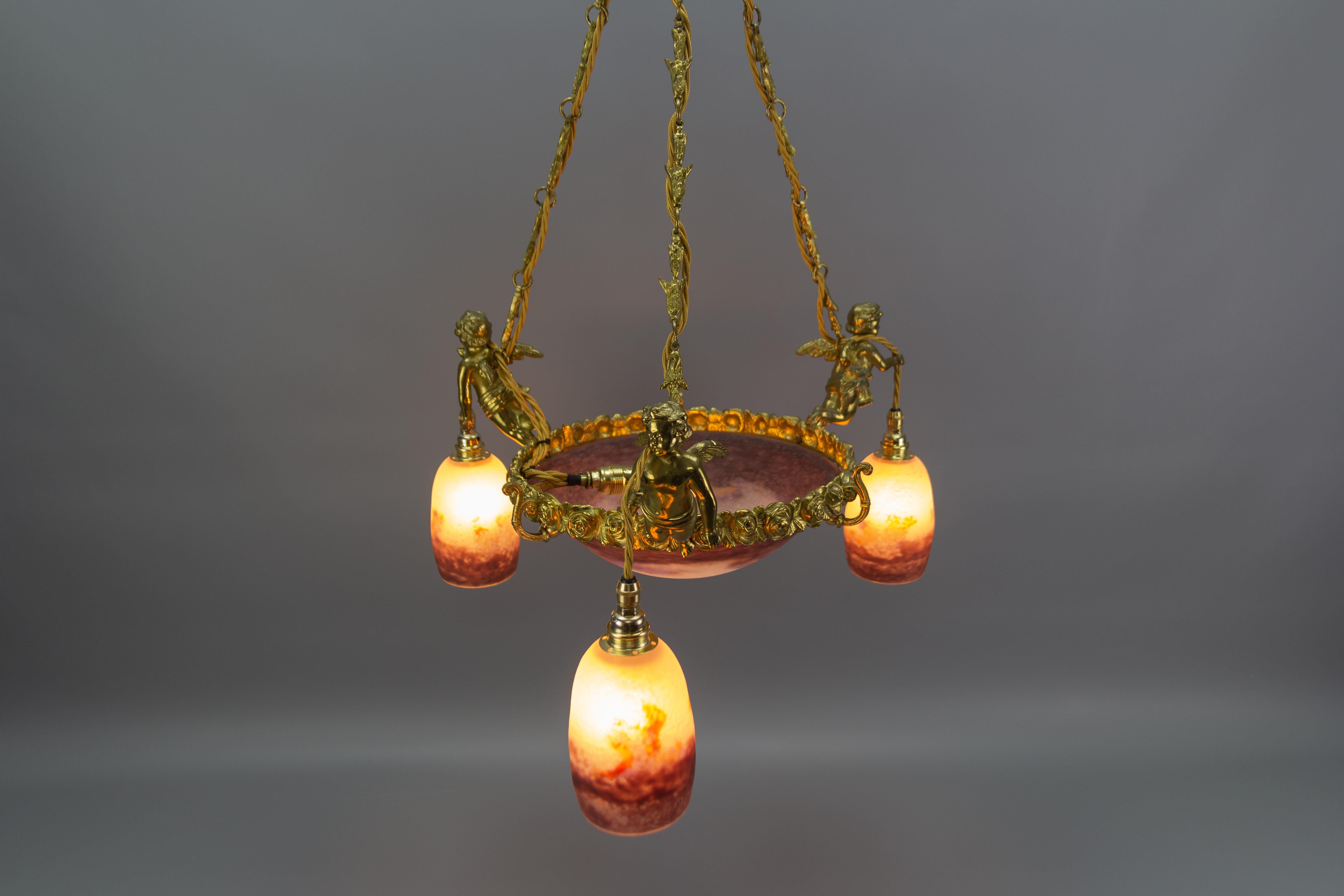 French Bronze Cherub Chandelier with Violet and White Glass Signed by Degué 8