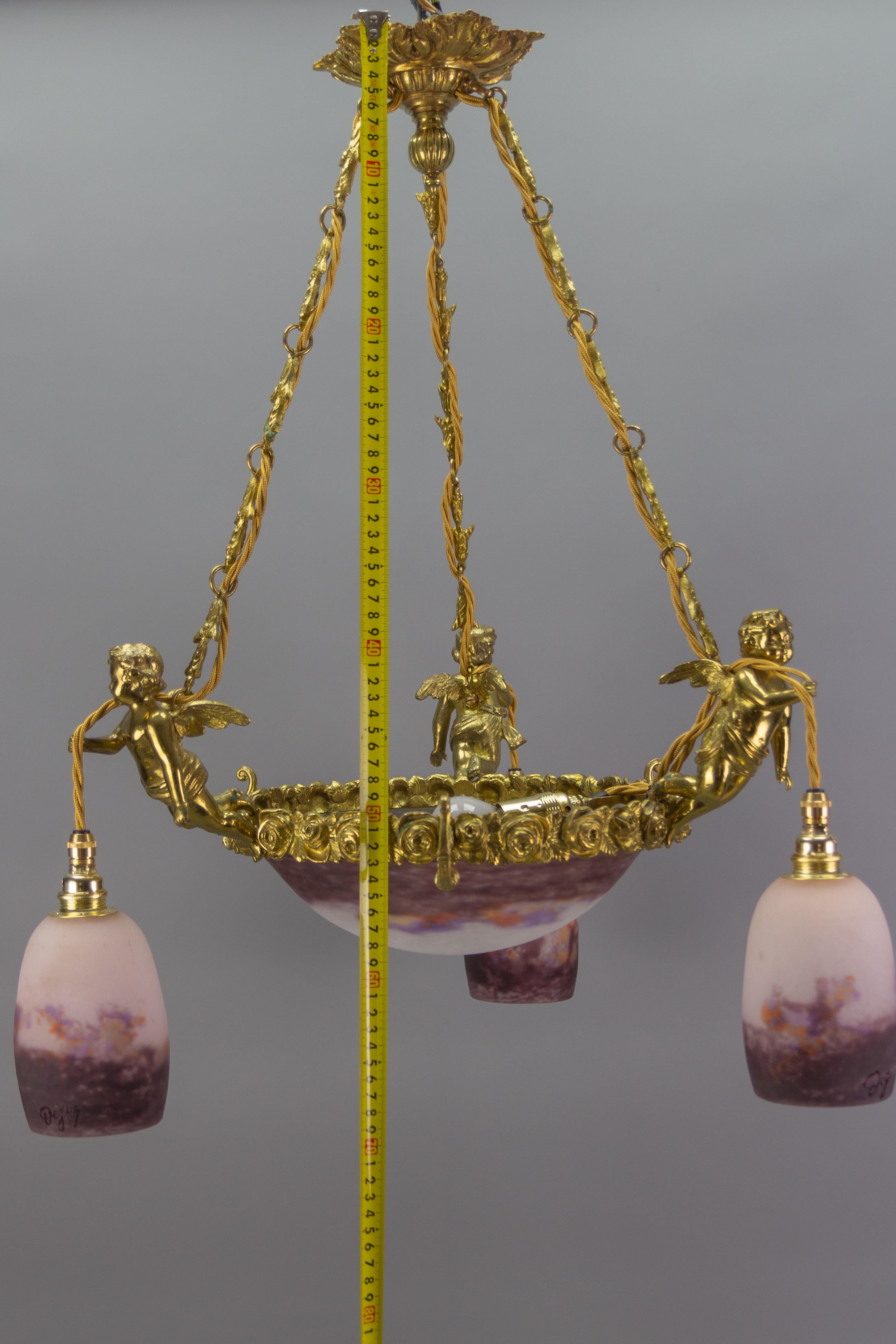 French Bronze Cherub Chandelier with Violet and White Glass Signed by Degué 14