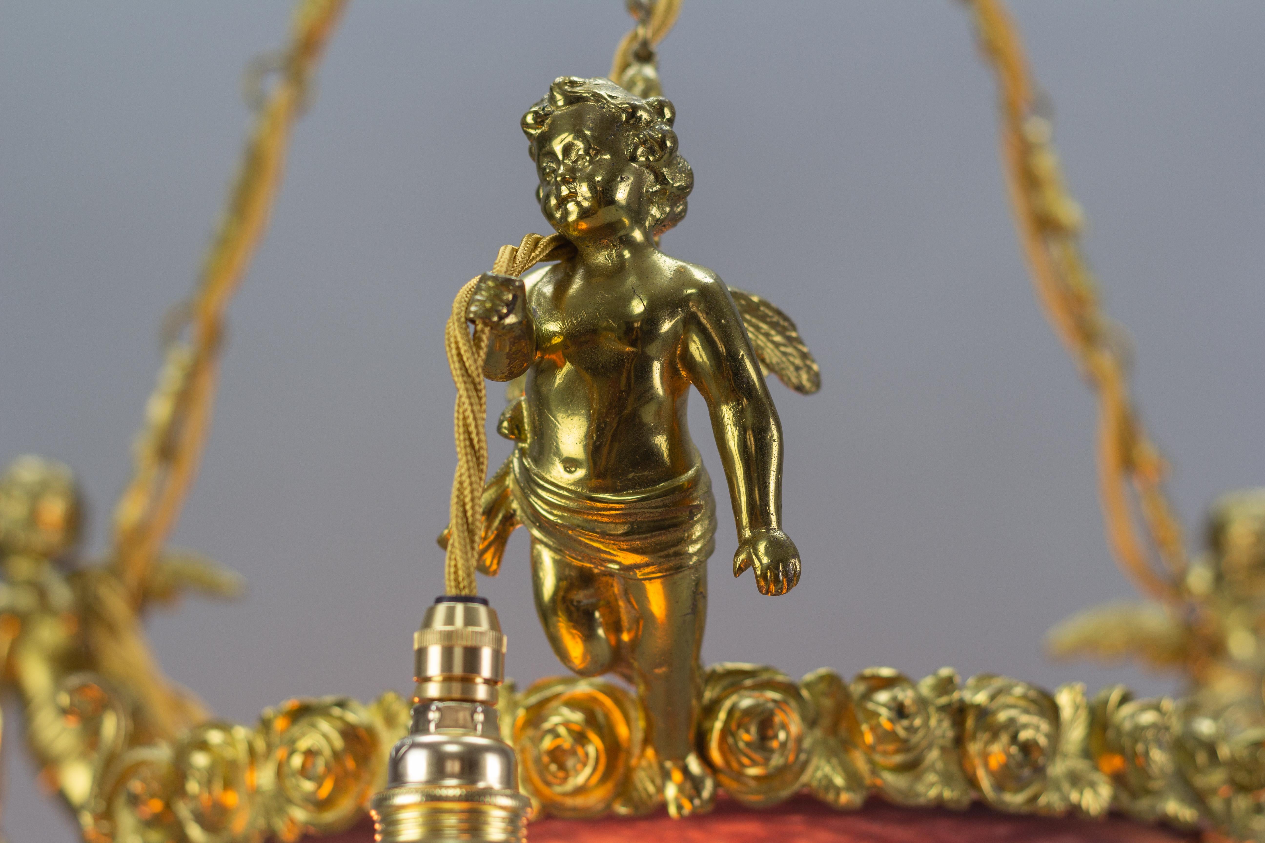 French Bronze Cherub Chandelier with Violet and White Glass Signed by Degué 1