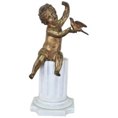 French Bronze Cherub Sitting on Marble Column