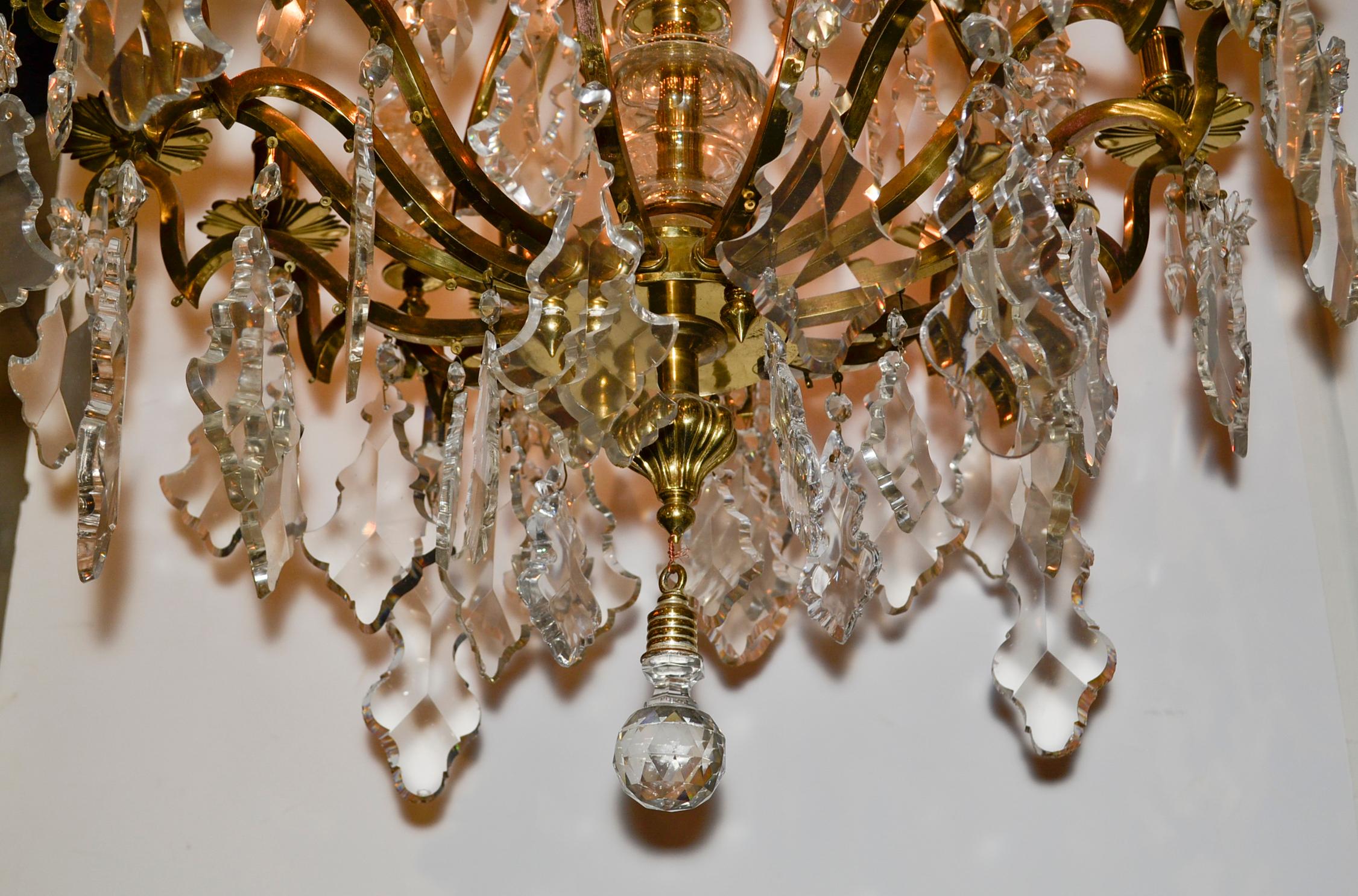 Excellent antique French gilt bronze and crystal 16-light chandelier.