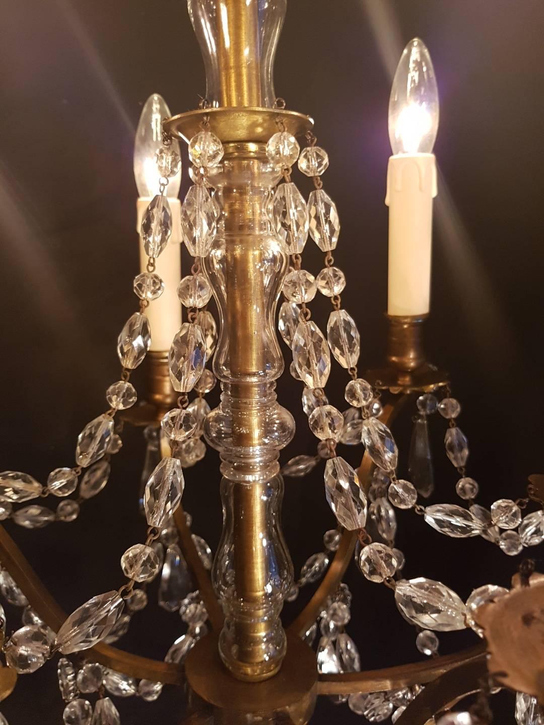 Early 20th Century French Bronze Crystal Six-Light Chandelier For Sale