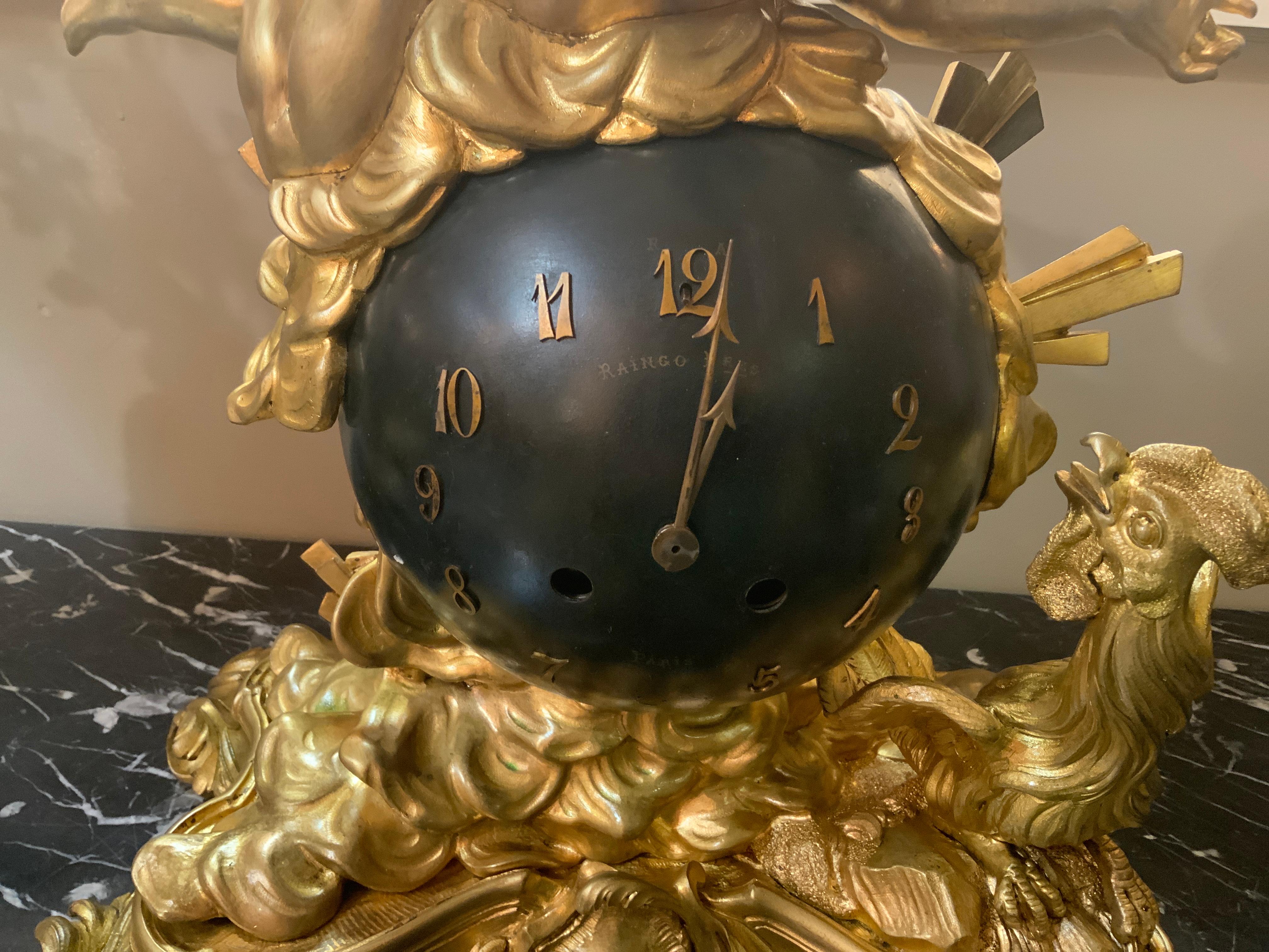 French bronze dore and black mantel/table clock by raingo feres 1890 In Excellent Condition For Sale In Houston, TX
