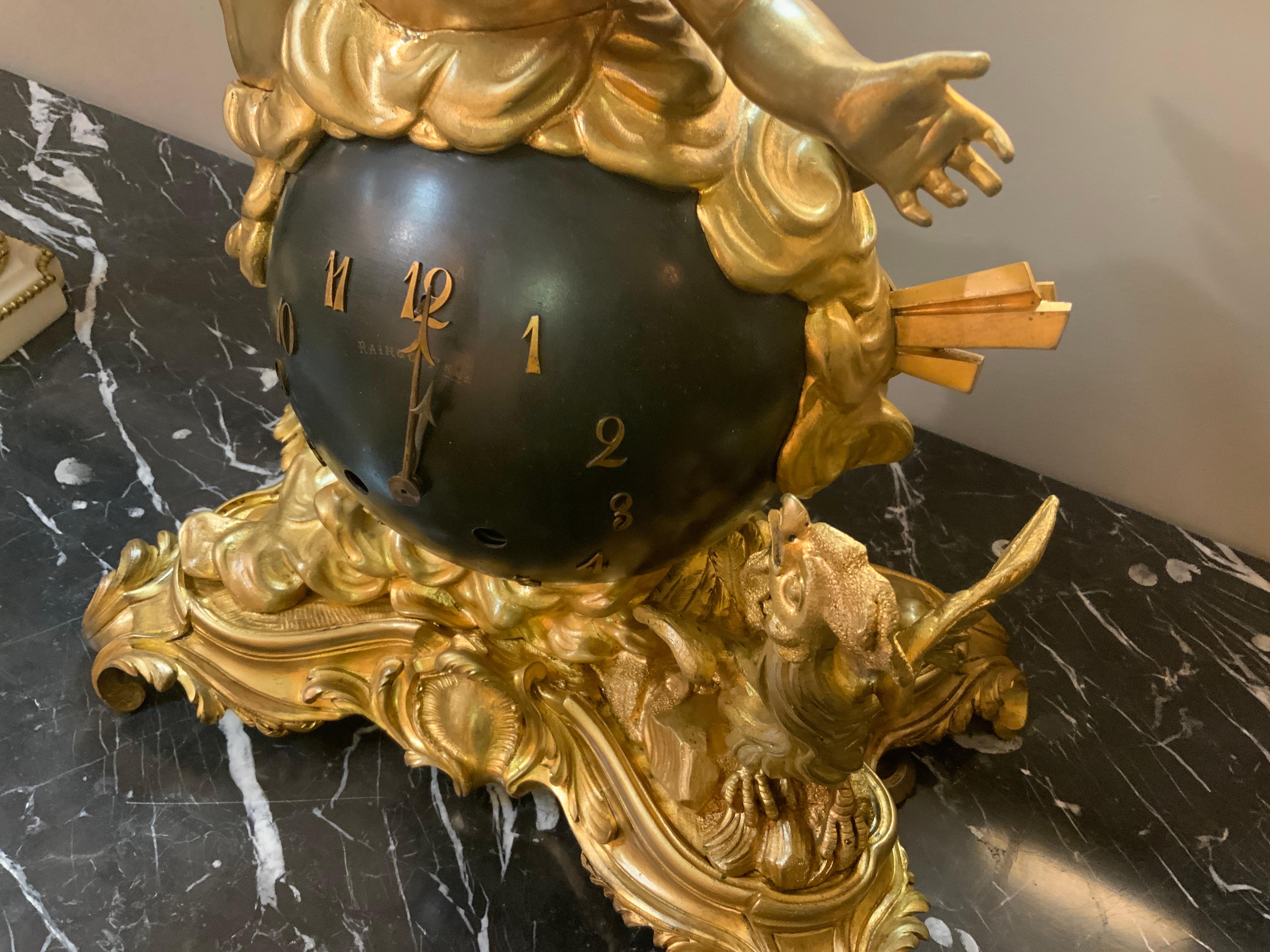 Bronze French bronze dore and black mantel/table clock by raingo feres 1890 For Sale