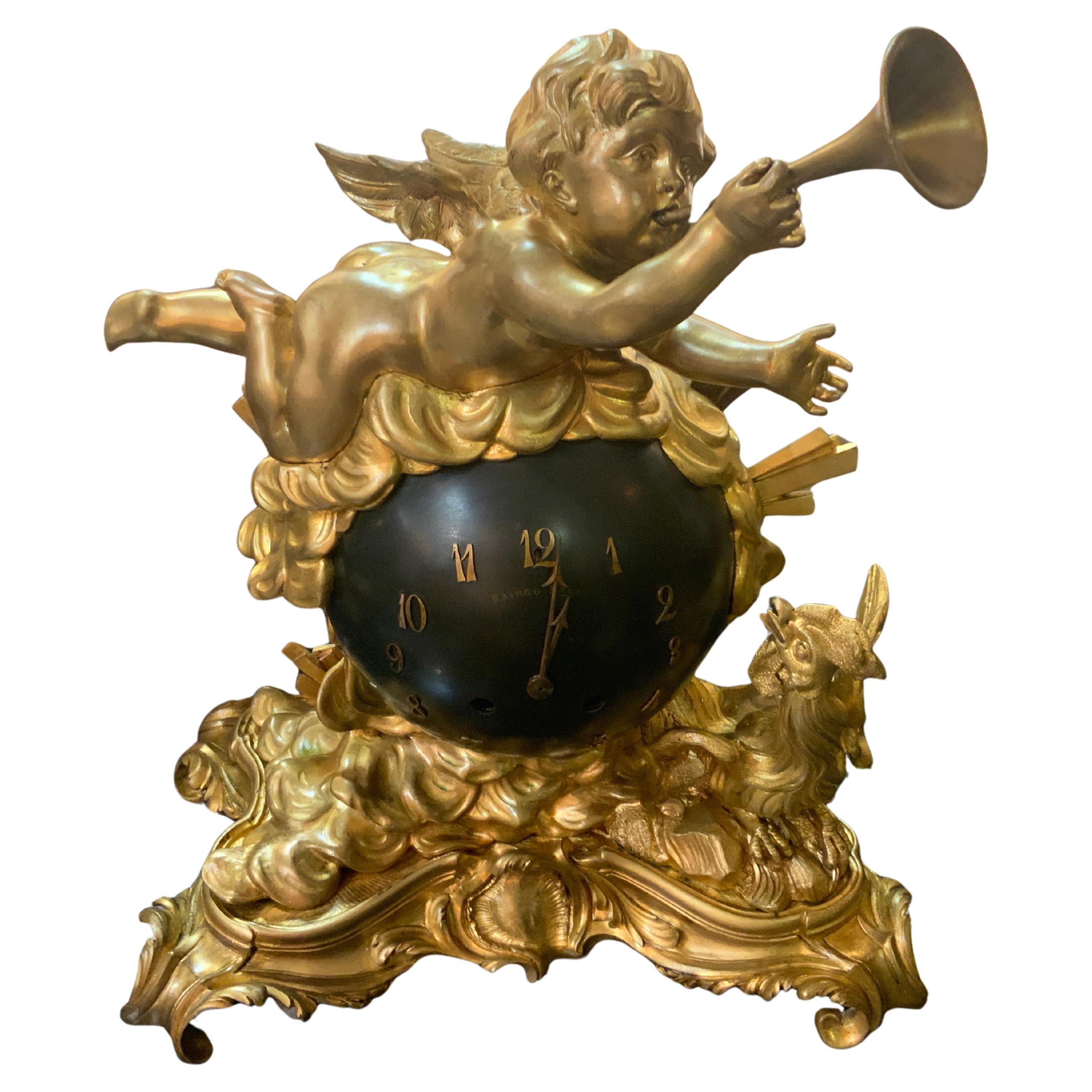 French bronze dore and black mantel/table clock by raingo feres 1890 For Sale