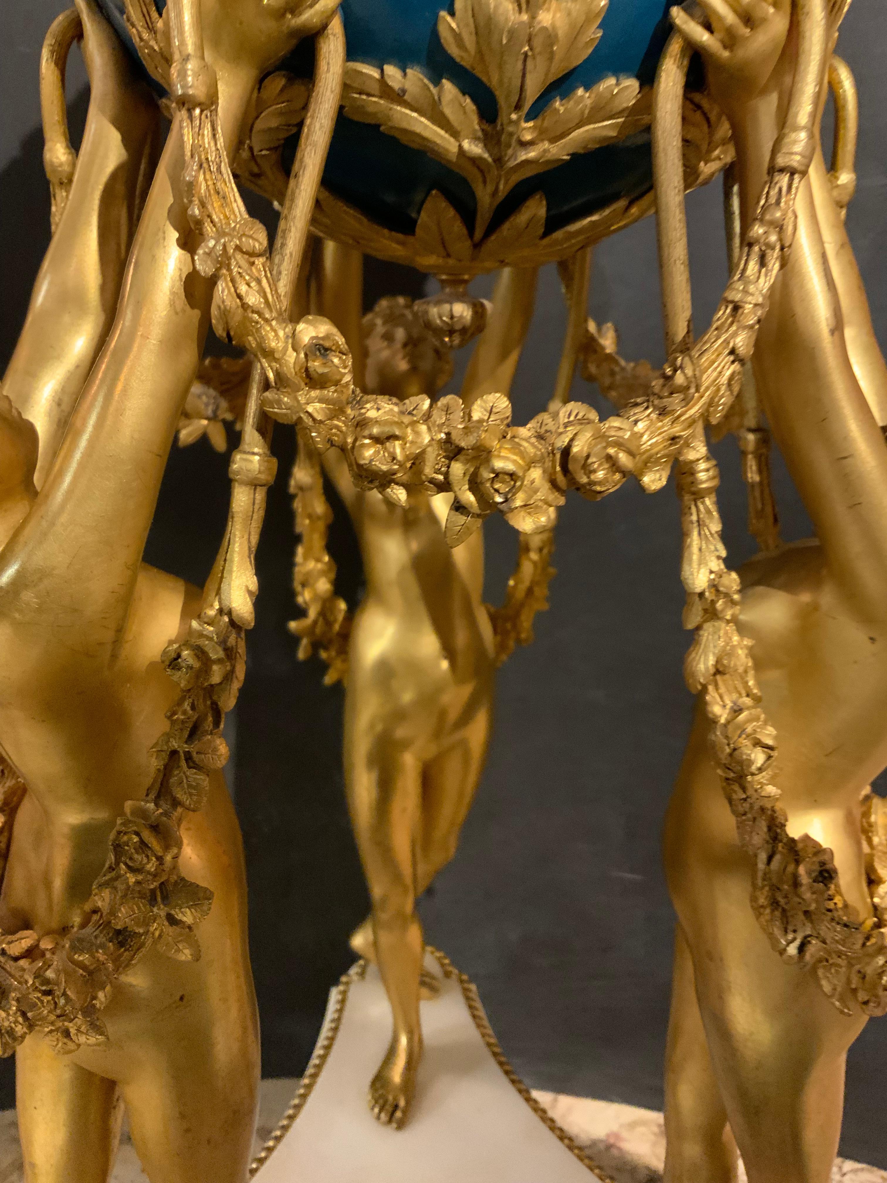 Louis XVI French bronze dore and marble annular clock depicting the Three Graces For Sale